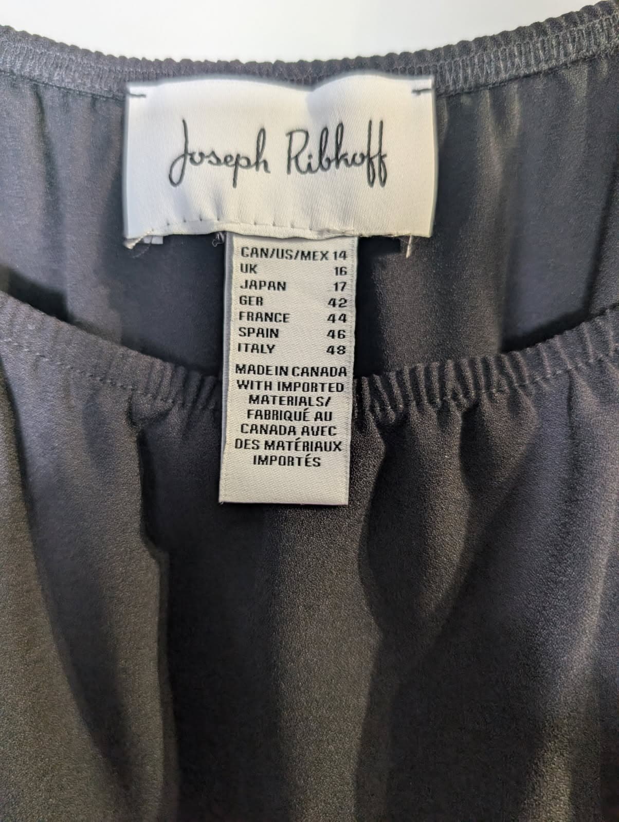 Joseph Ribkoff Black Mesh Sleeve Blouse with Circular Appliqué — photo 3 of 7