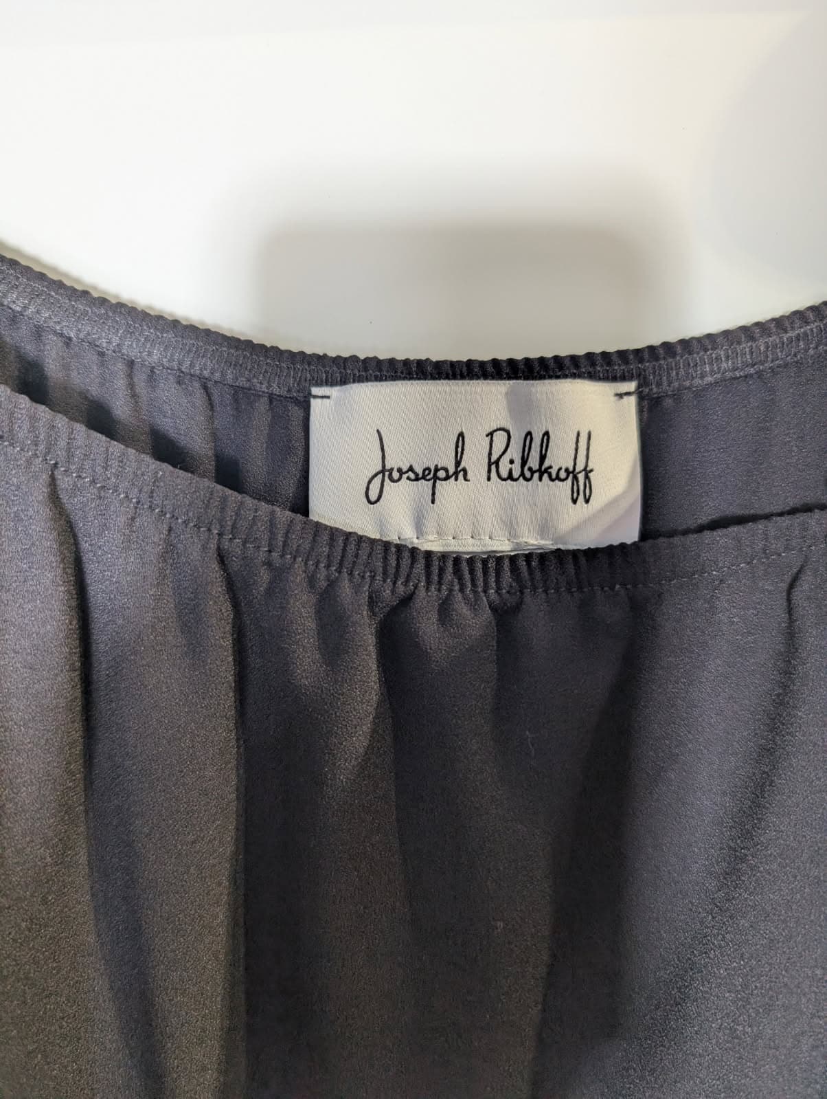 Joseph Ribkoff Black Mesh Sleeve Blouse with Circular Appliqué — photo 4 of 7