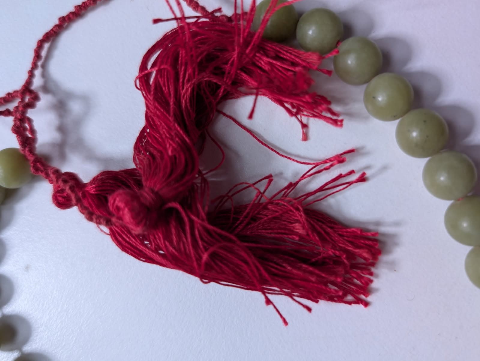 Traditional Green Bead Prayer Mala With Red Silk Tassels — photo 3 of 6