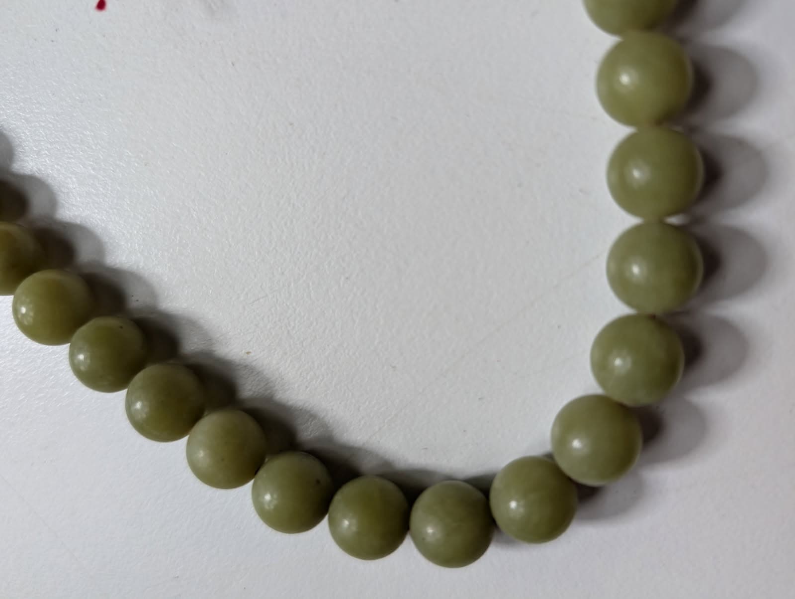 Traditional Green Bead Prayer Mala With Red Silk Tassels — photo 4 of 6