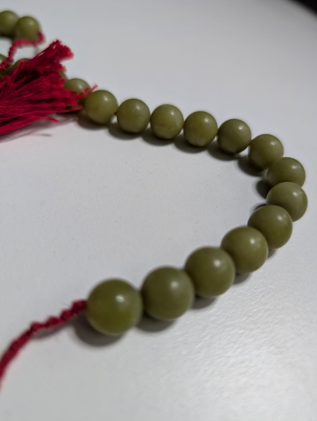 Traditional Green Bead Prayer Mala With Red Silk Tassels — photo 6 of 6