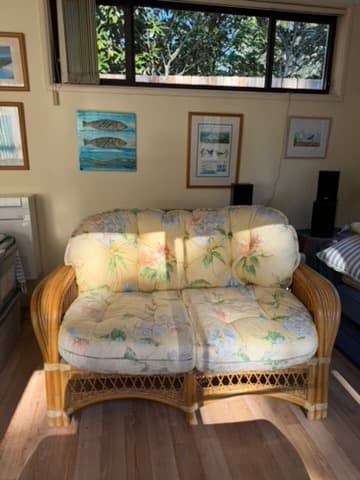 Vintage Rattan Wicker Loveseat Floral Cushions — photo 3 of 7