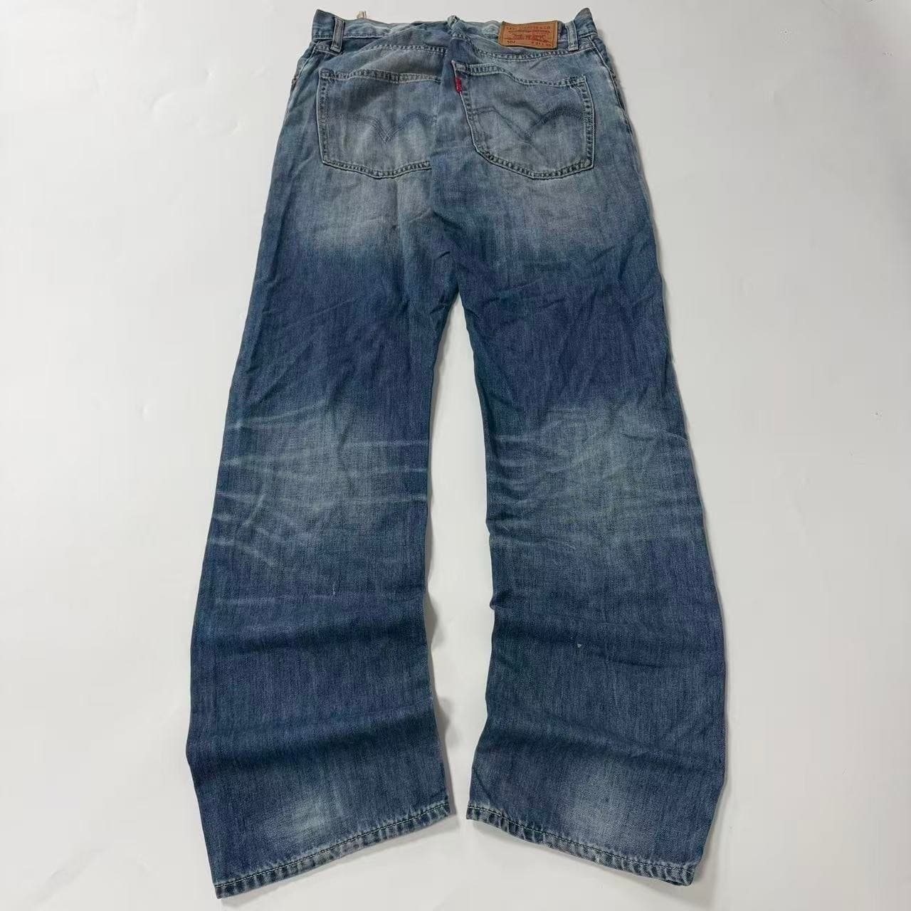 2000s Levi Strauss & Co. 502 Regular Taper Jeans — photo 6 of 7