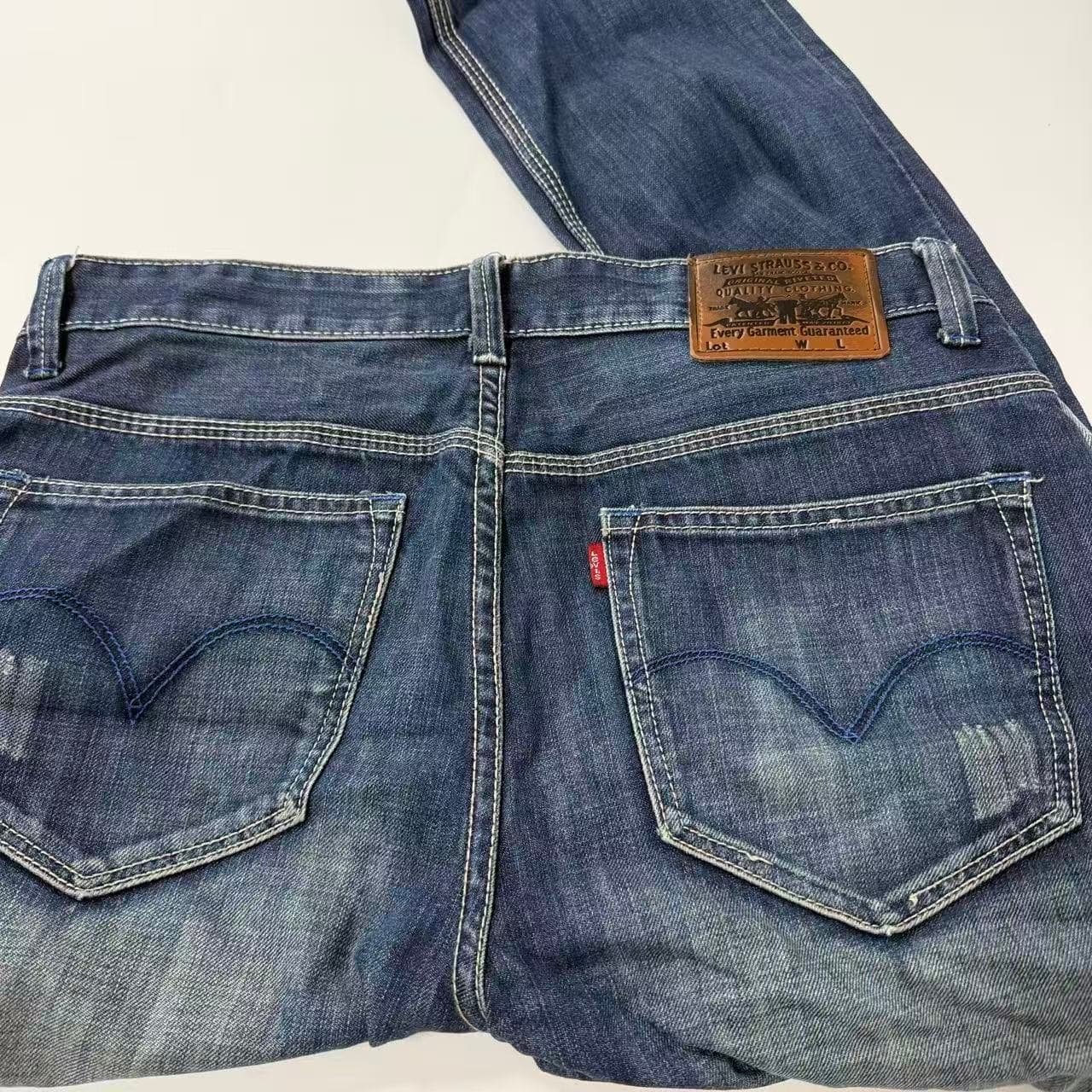2000s Levi Strauss & Co Distressed Blue Jeans — photo 4 of 6