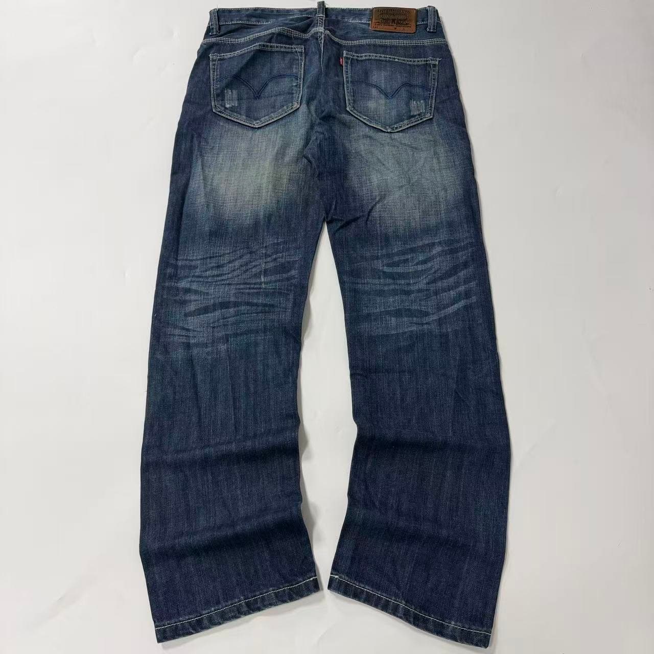2000s Levi Strauss & Co Distressed Blue Jeans — photo 5 of 6