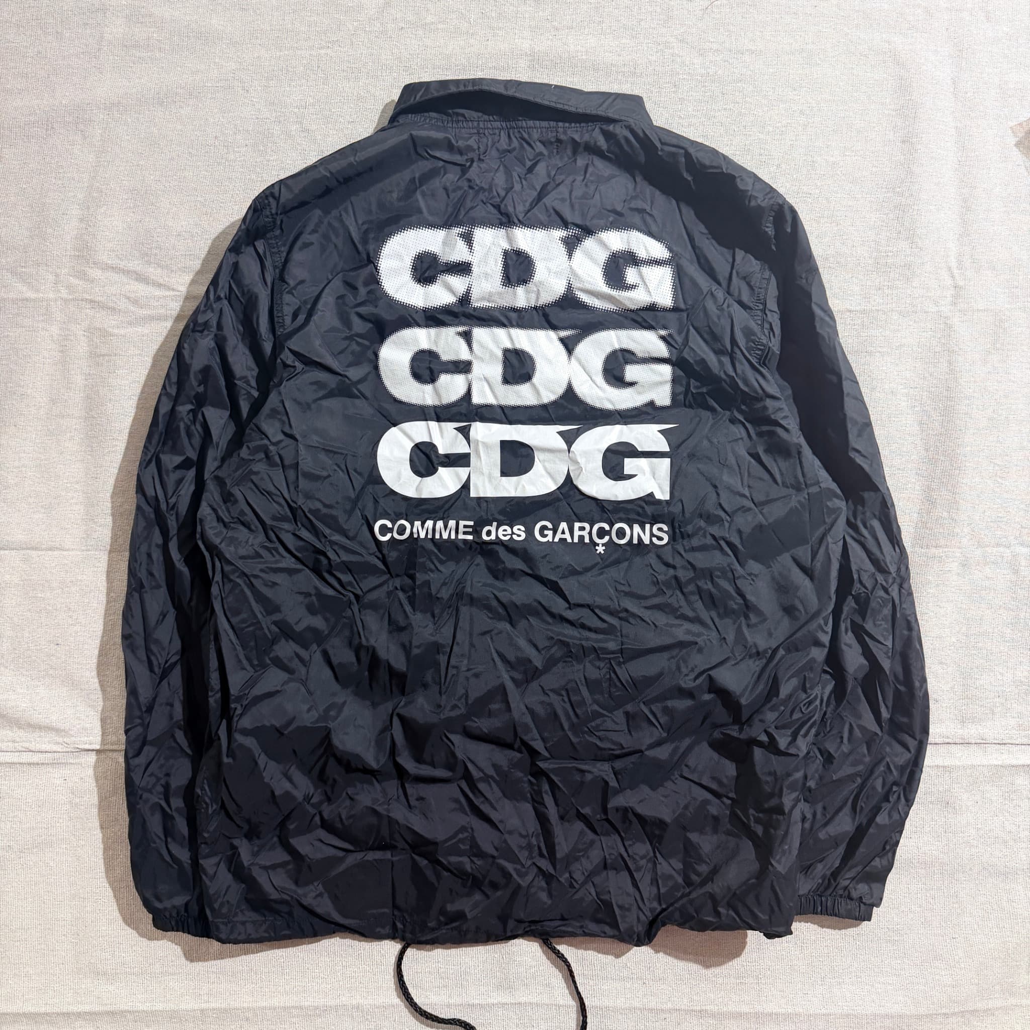 CDG Black Nylon Coach Jacket — photo 1 of 10
