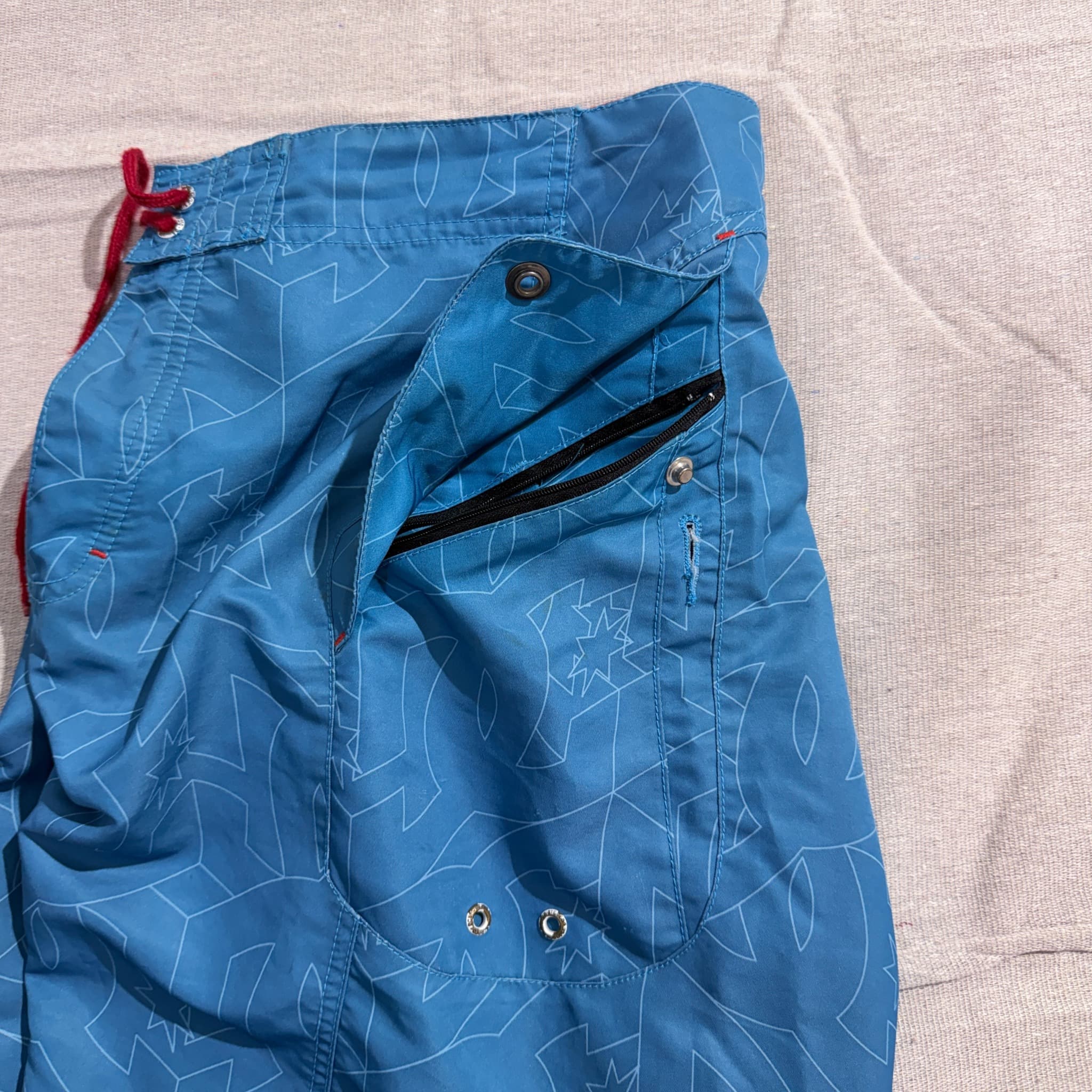 DC Men's Blue All-Over Logo Print Board Shorts — photo 8 of 9