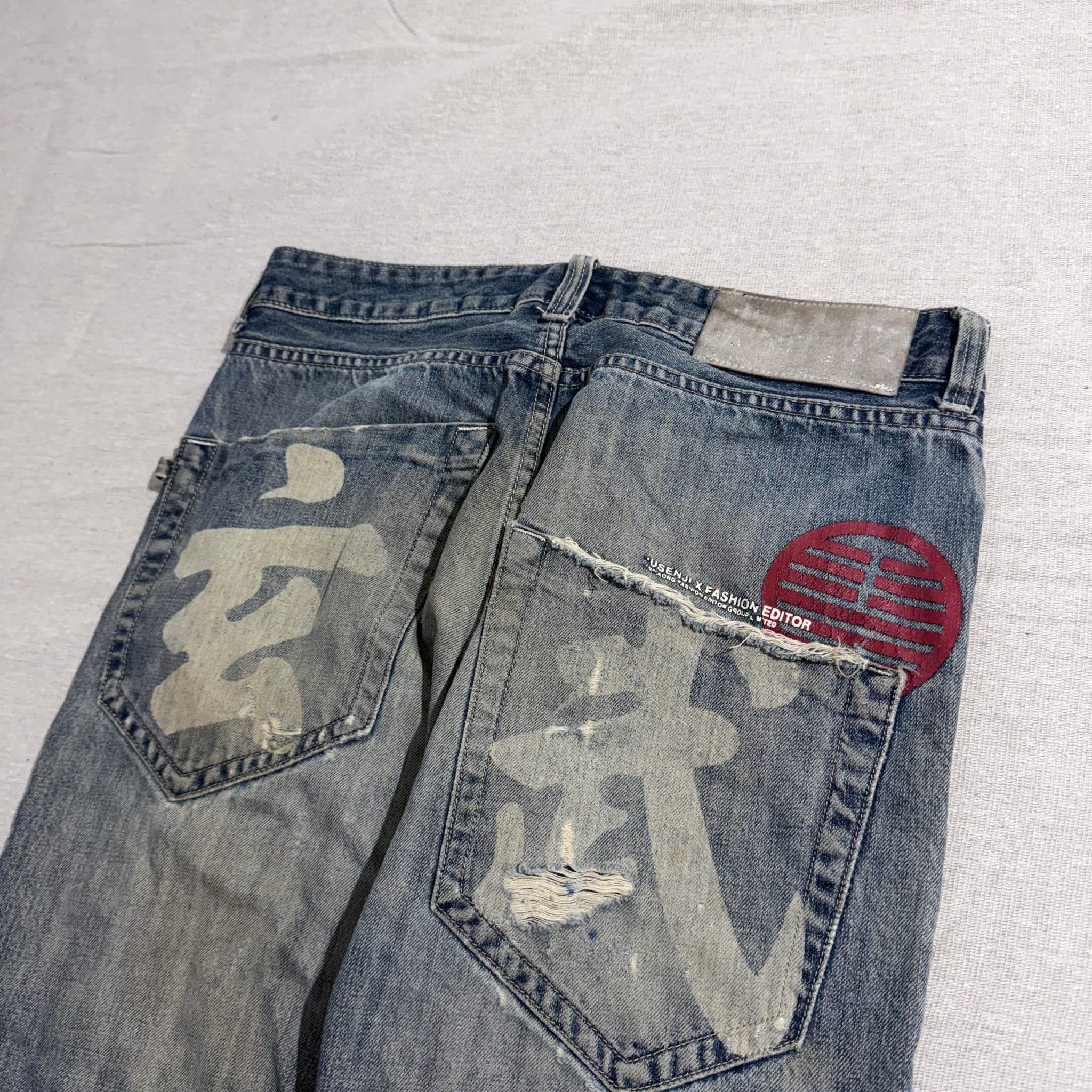 HUSENJI Distressed Denim Jeans With Kanji Print And Camo Patchwork — photo 3 of 10