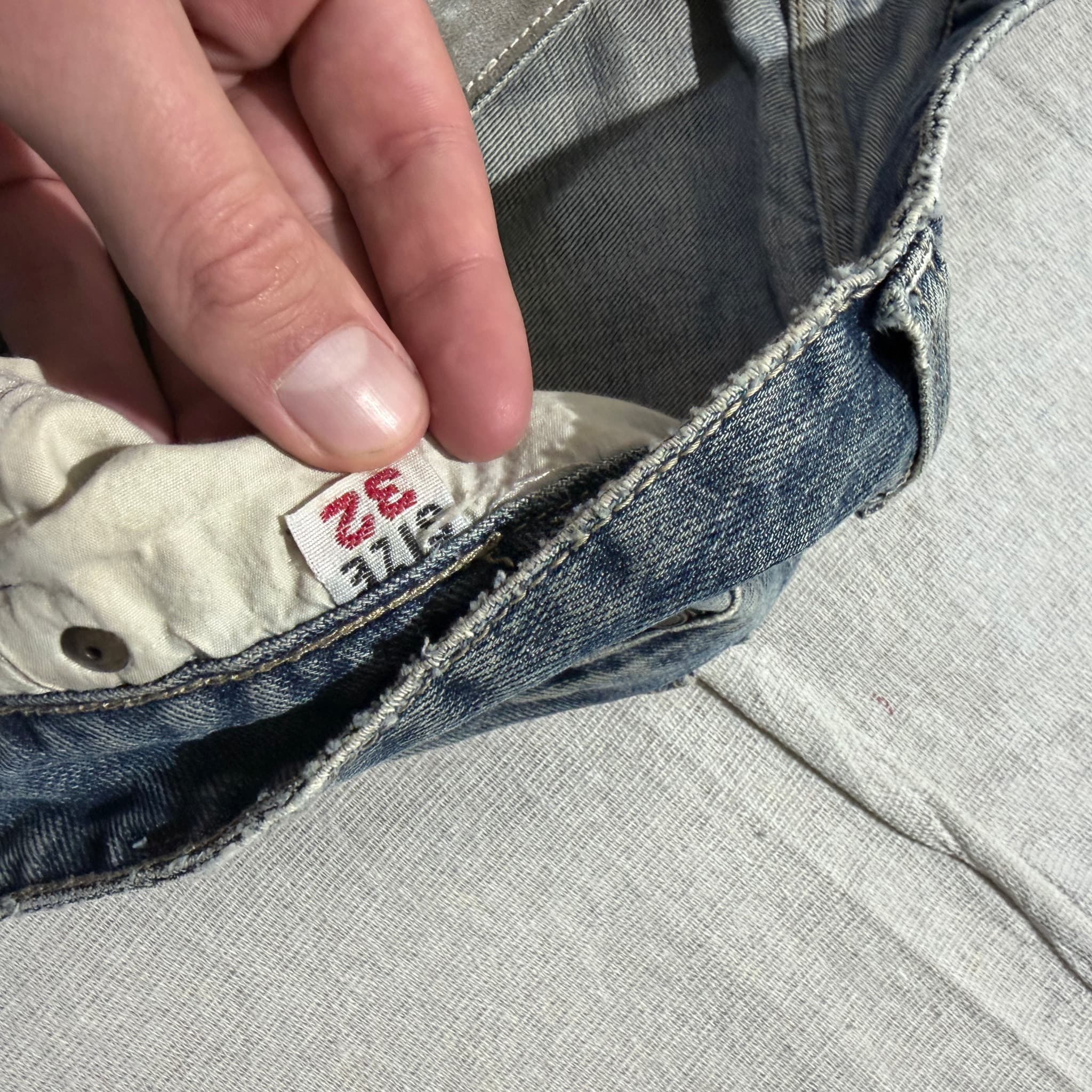 HUSENJI Distressed Denim Jeans With Kanji Print And Camo Patchwork — photo 9 of 10
