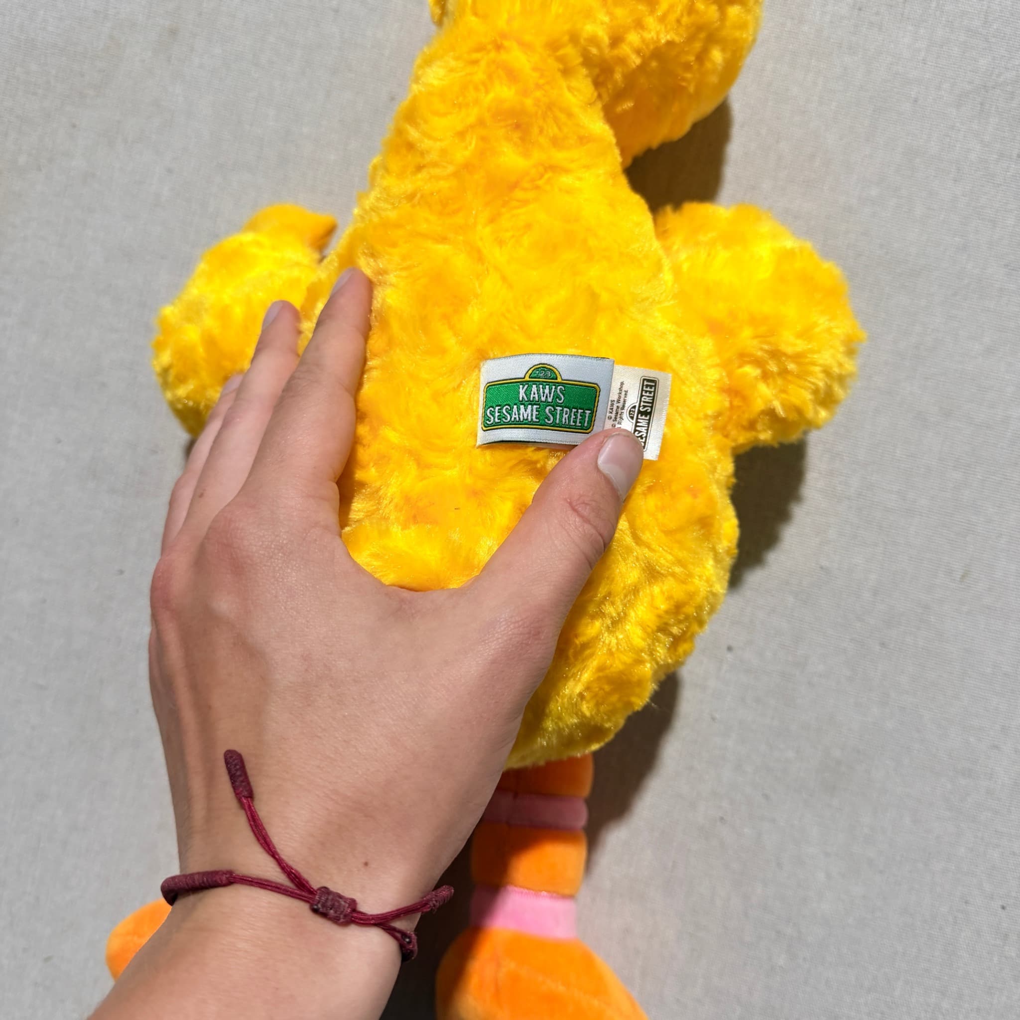 KAWS x Sesame Street Big Bird Plush Toy Yellow — photo 5 of 7
