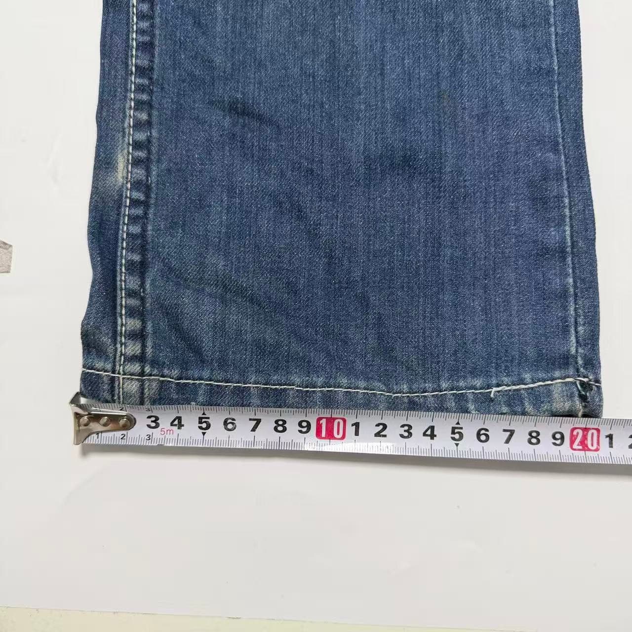 Lee Slim Straight Distressed Denim Jeans — photo 6 of 10