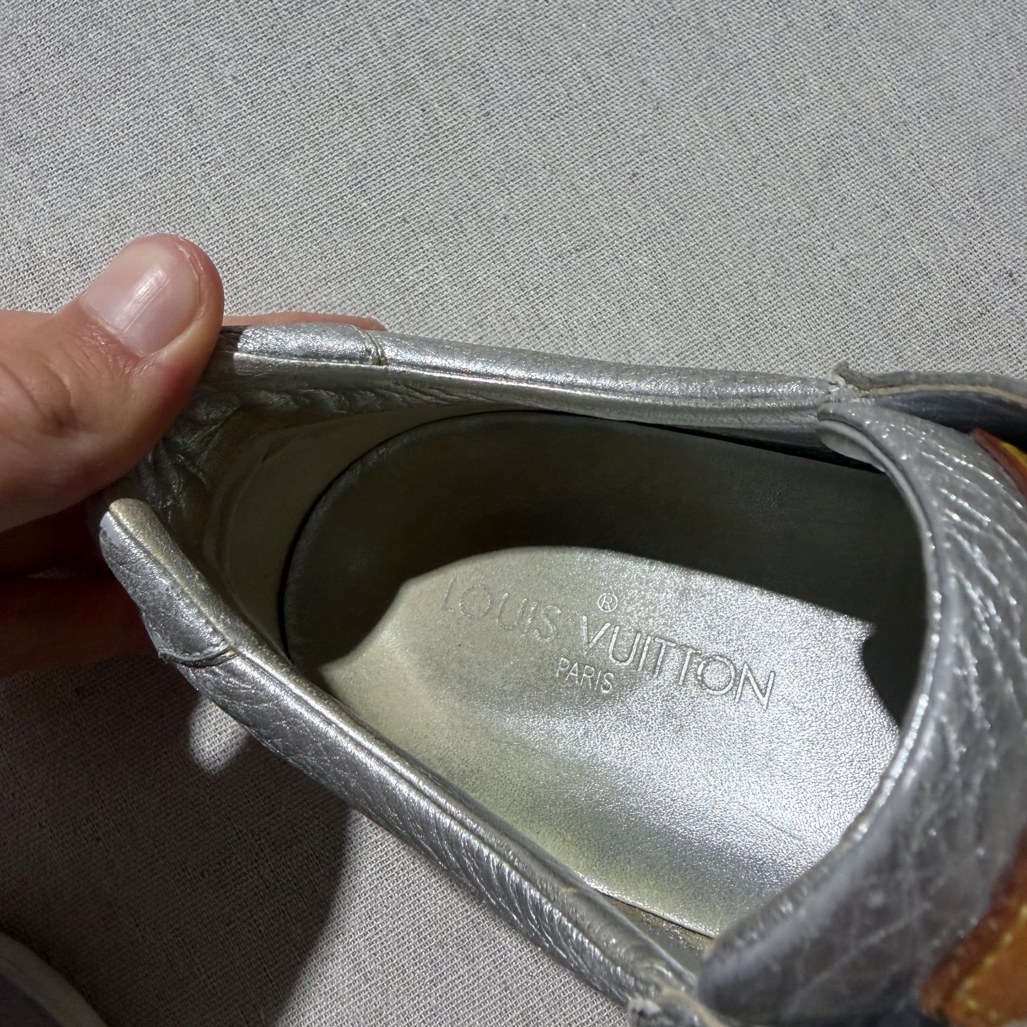 Louis Vuitton Silver Metallic Leather Perforated Logo Sneakers — photo 2 of 8