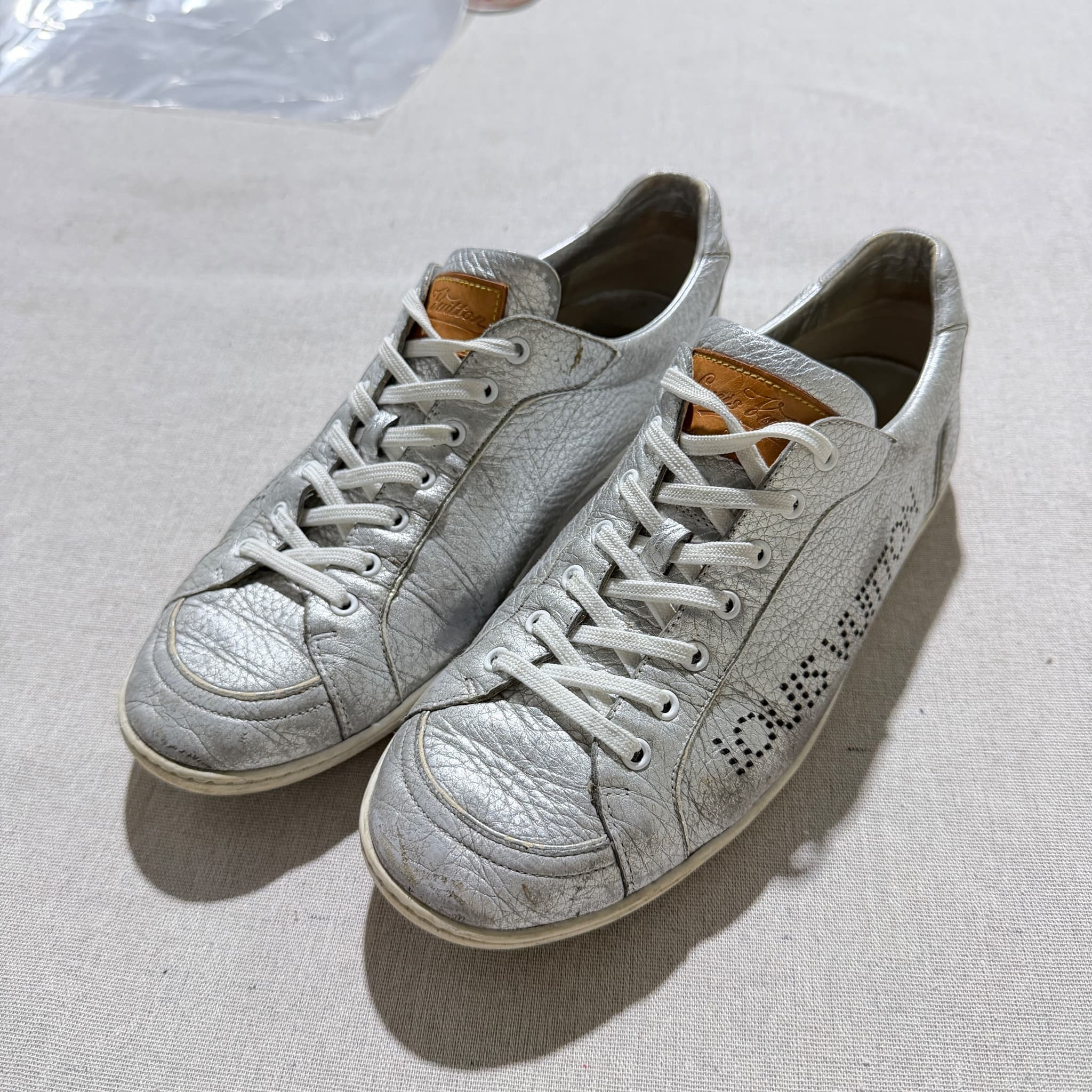 Louis Vuitton Silver Metallic Leather Perforated Logo Sneakers — photo 4 of 8