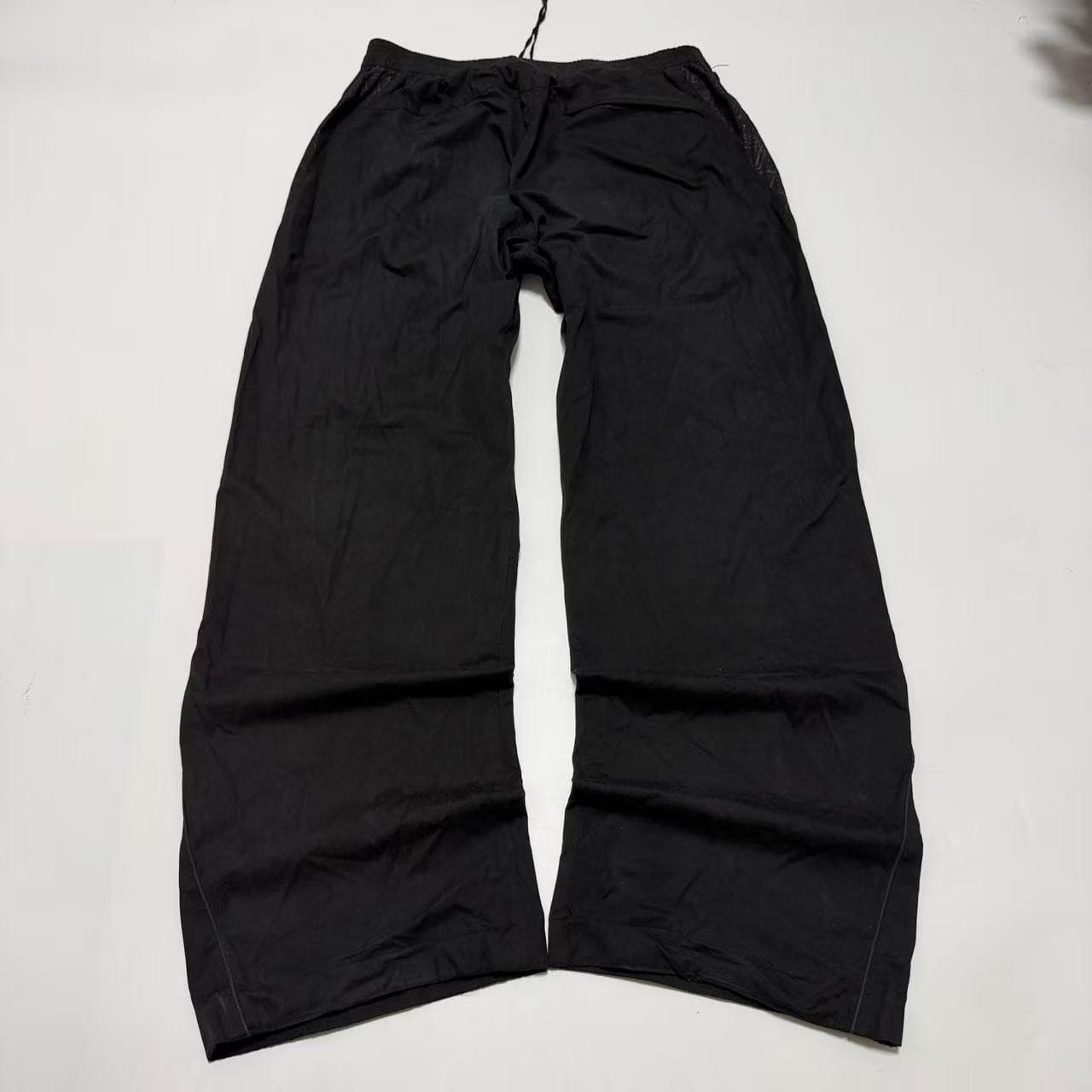 Vintage 2000s Nike Black Nylon Track Pants — photo 9 of 10