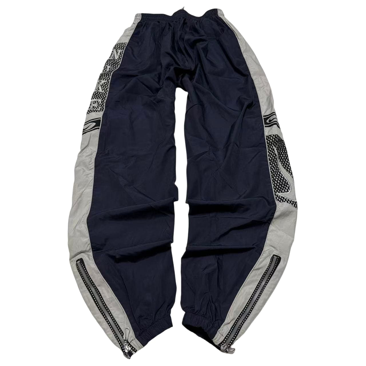 Vintage 90s Nike Swoosh Nylon Track Pants — photo 1 of 12