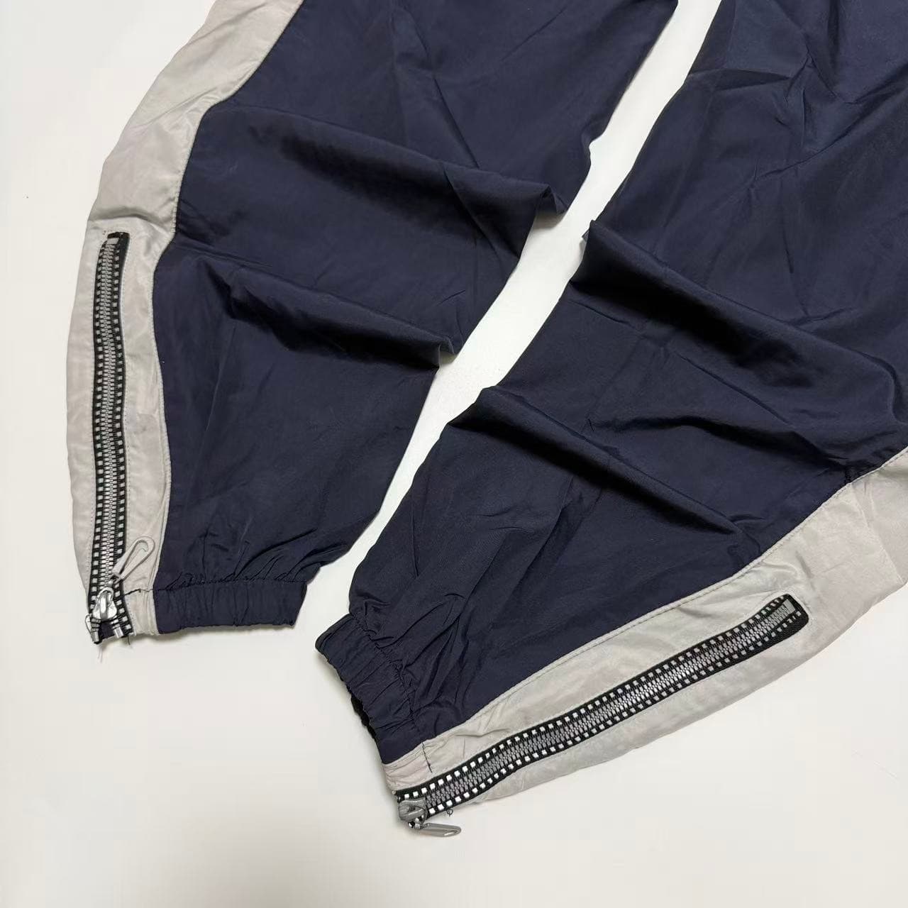 Vintage 90s Nike Swoosh Nylon Track Pants — photo 9 of 12