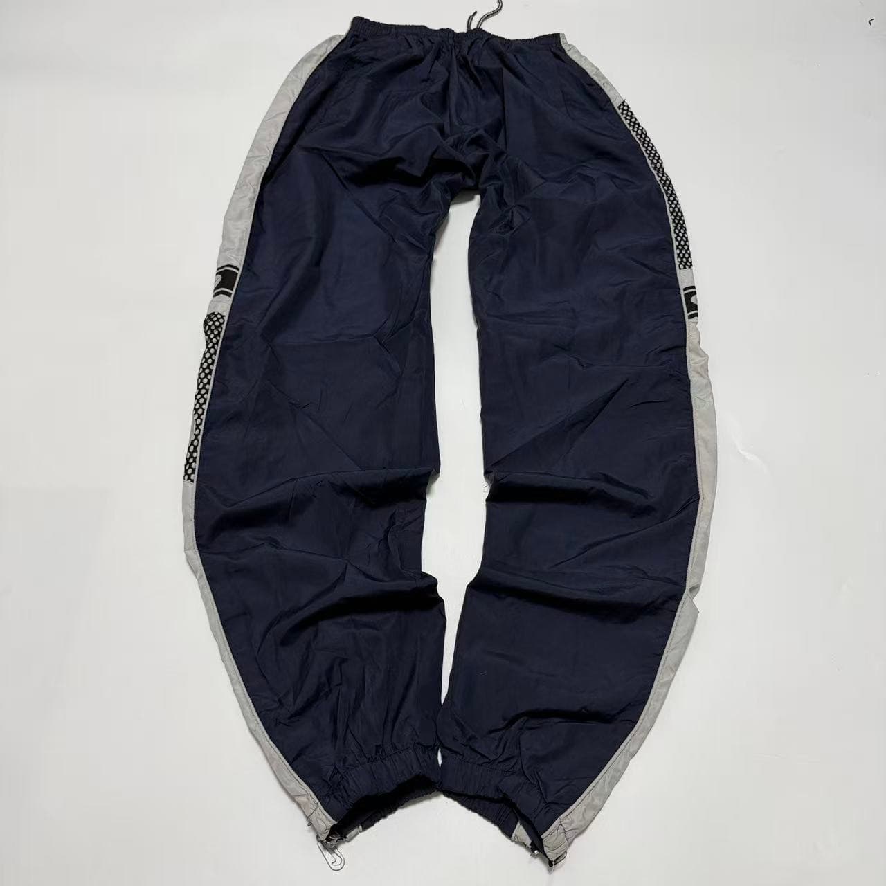Vintage 90s Nike Swoosh Nylon Track Pants — photo 2 of 12