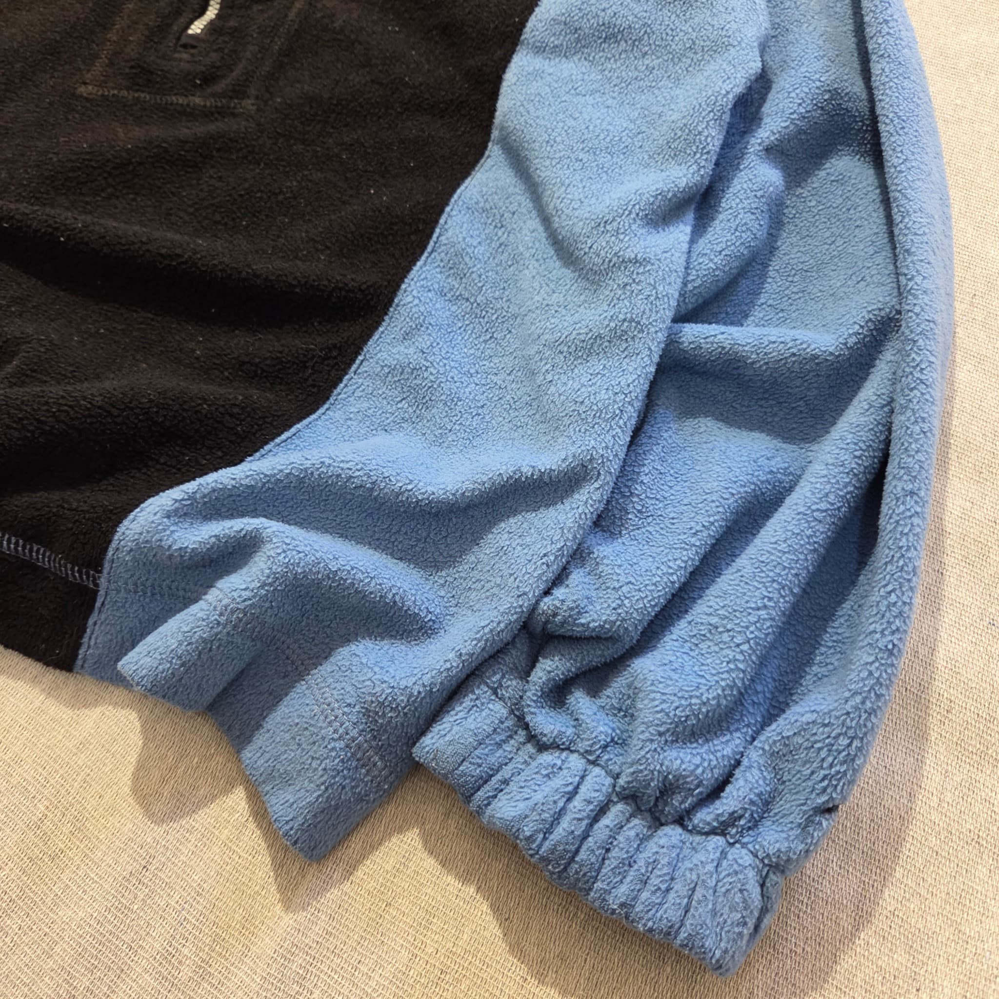 Vintage Helly Hansen 1/4 Zip Fleece Pullover Black Blue — photo 2 of 6