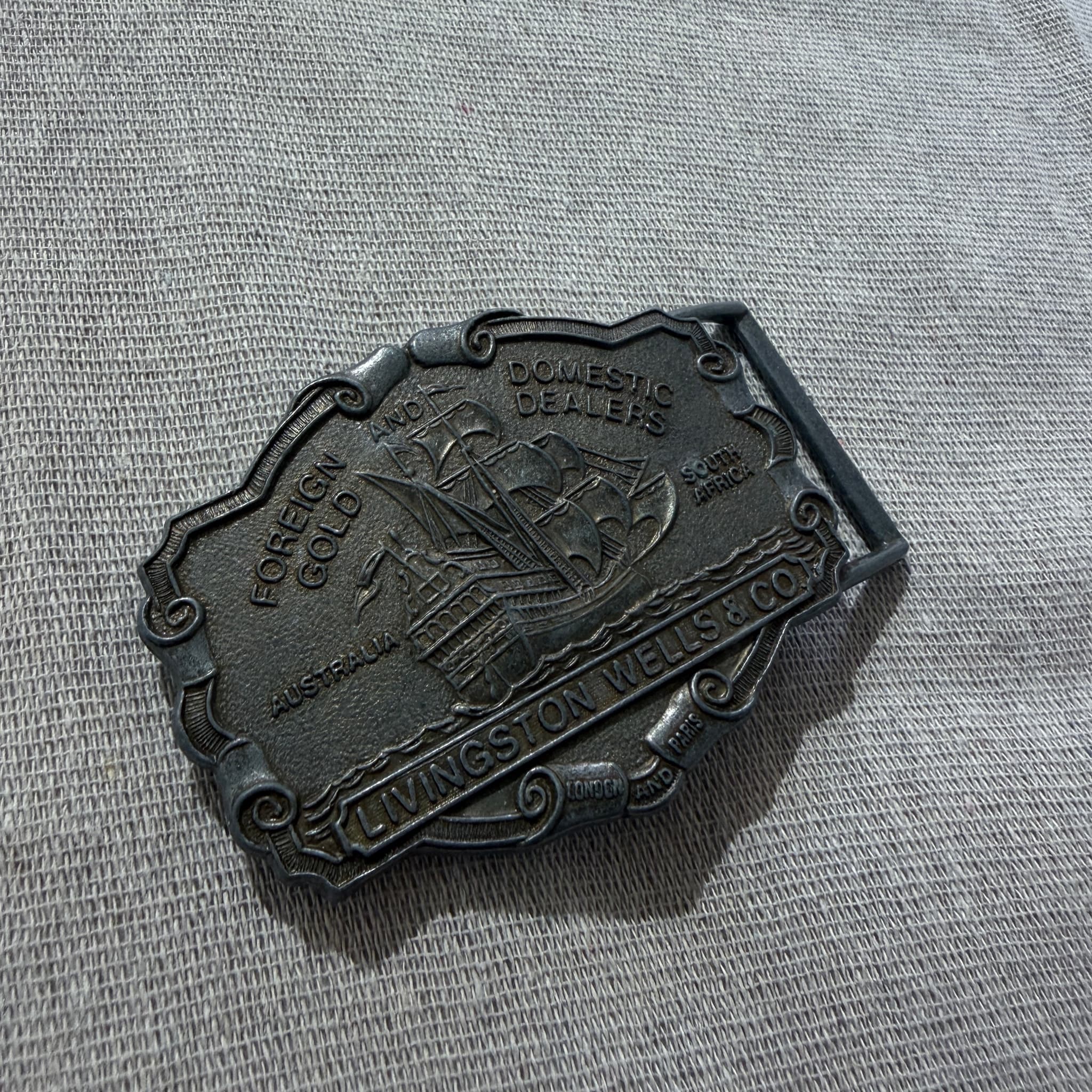 Vintage LIVINGSTON WELLS & CO Foreign And Domestic Gold Dealers Belt Buckle — photo 2 of 6
