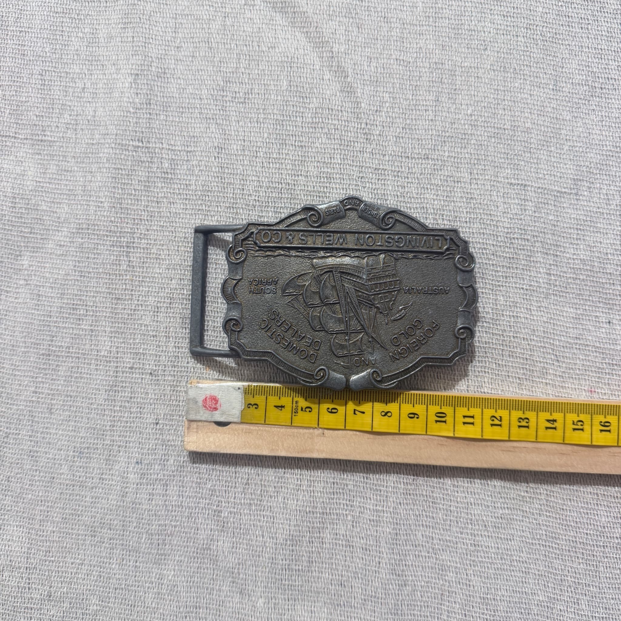 Vintage LIVINGSTON WELLS & CO Foreign And Domestic Gold Dealers Belt Buckle — photo 5 of 6
