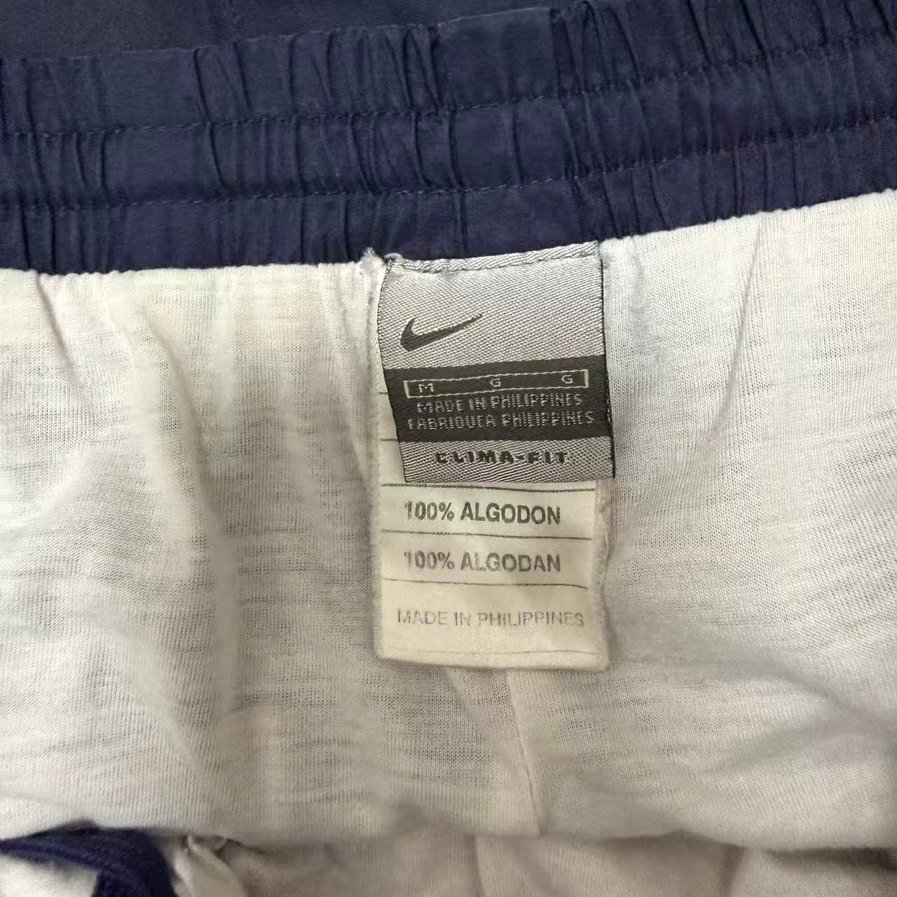 Vintage Nike Navy Blue Nylon Track Pants — photo 3 of 9