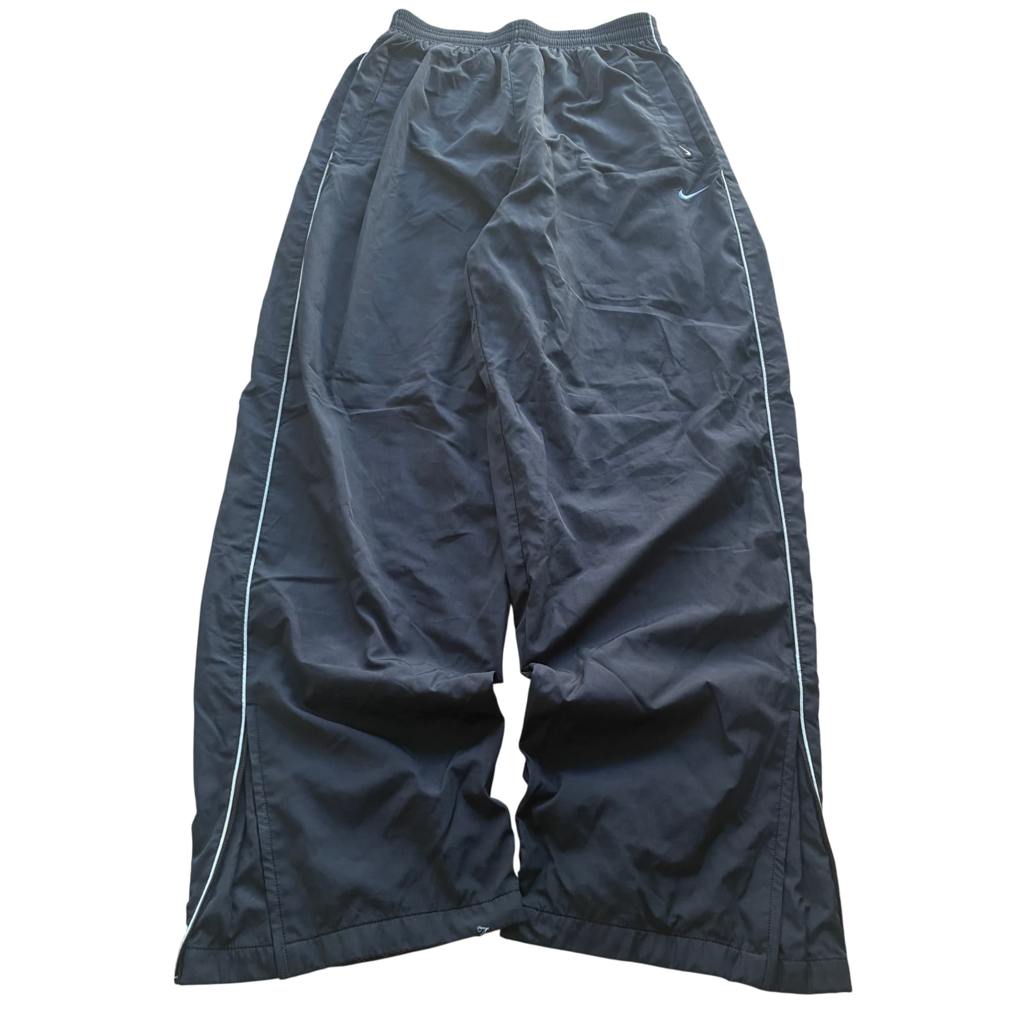 Vintage Nike Swoosh Nylon Track Pants — photo 1 of 7