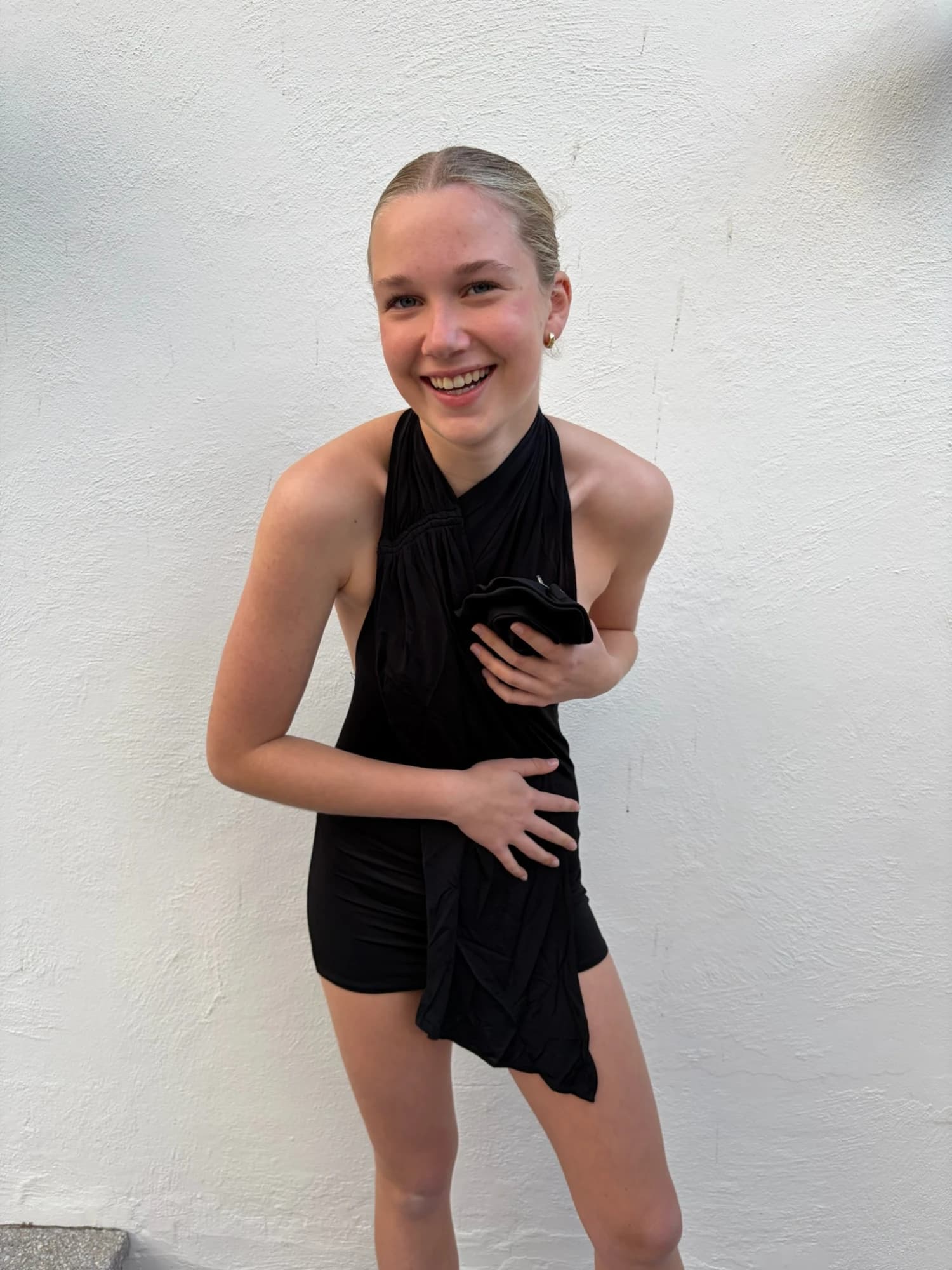 Black Halterneck Mini Dress With Rosette — photo 1 of 3