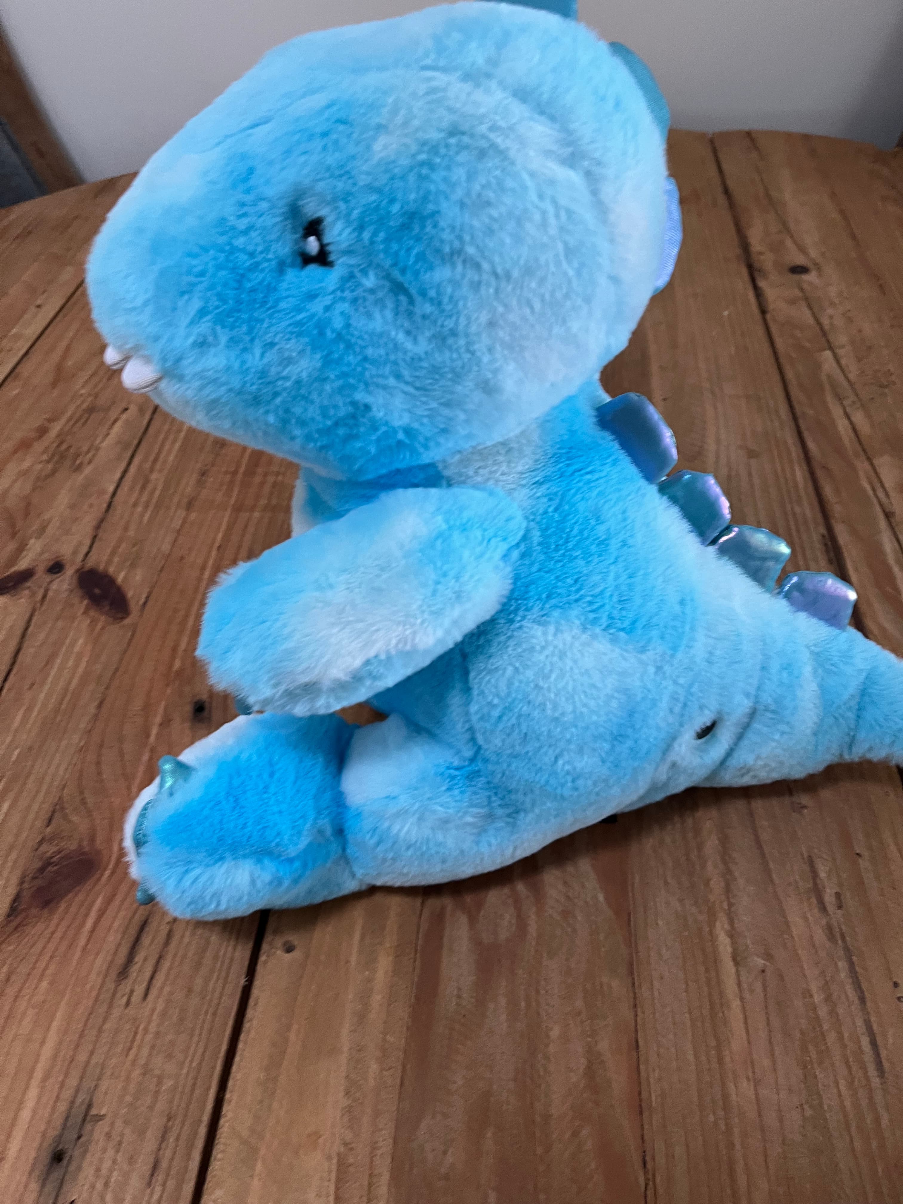 F.A.O SCHWARZ Glow Brights Blue Dinosaur Plush Toy With Sound & Light — photo 1 of 13