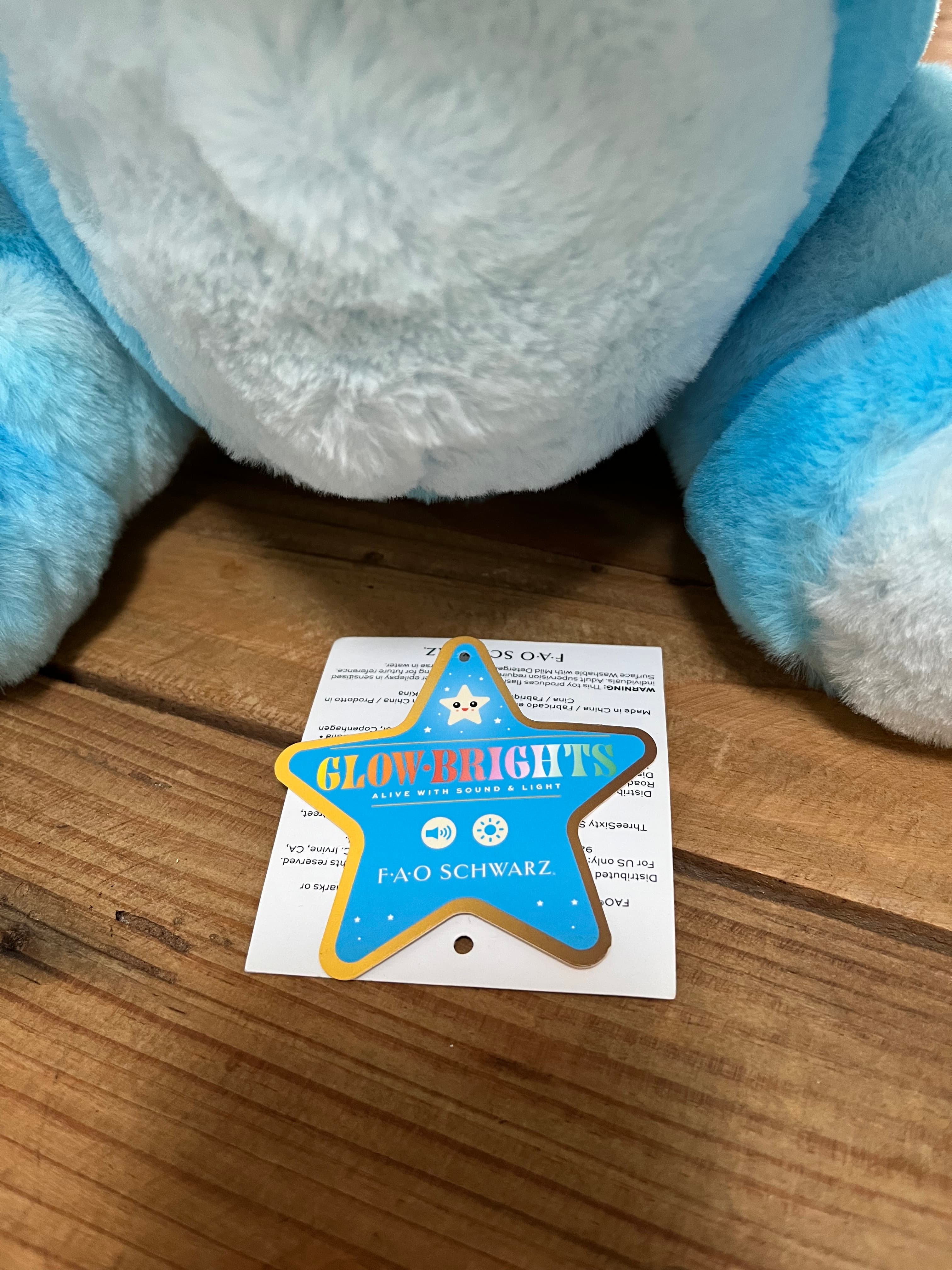 F.A.O SCHWARZ Glow Brights Blue Dinosaur Plush Toy With Sound & Light — photo 13 of 13
