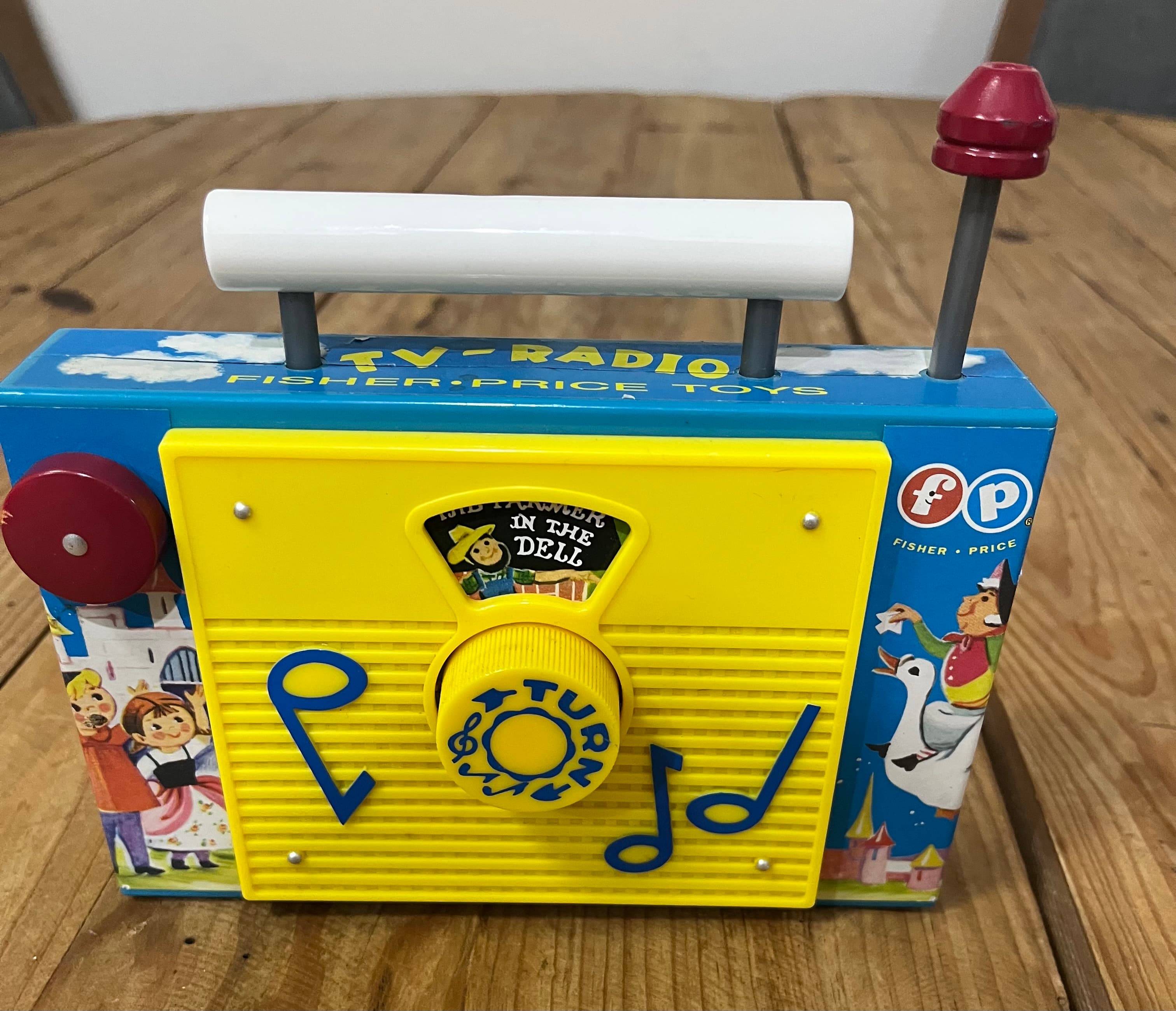 Vintage Fisher-Price TV-Radio Toy The Farmer In The Dell Musical Wind-Up — photo 1 of 3