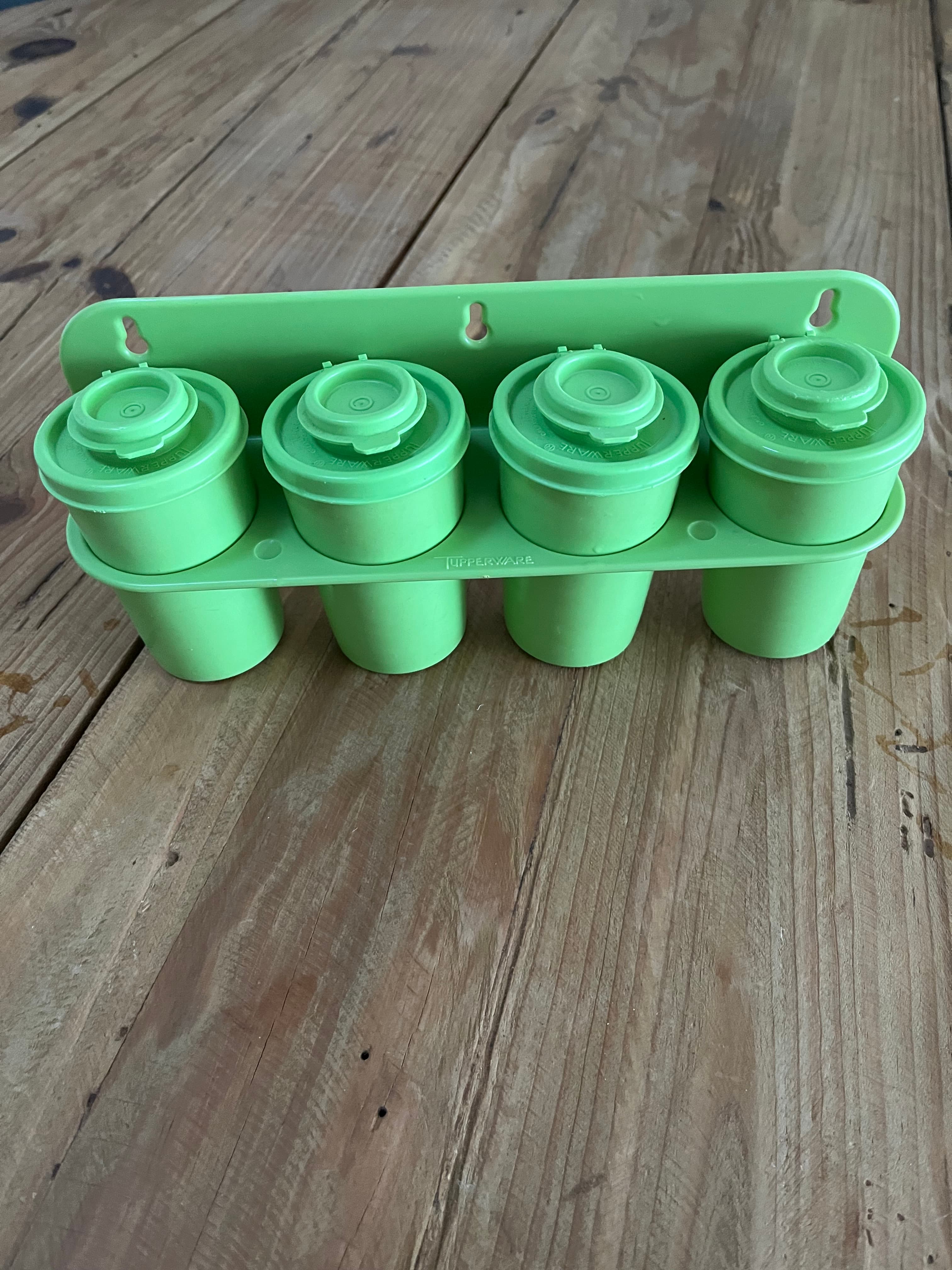 Vintage Tupperware Wall-Mount Spice Rack With 4 Mini Canisters Green — photo 1 of 5