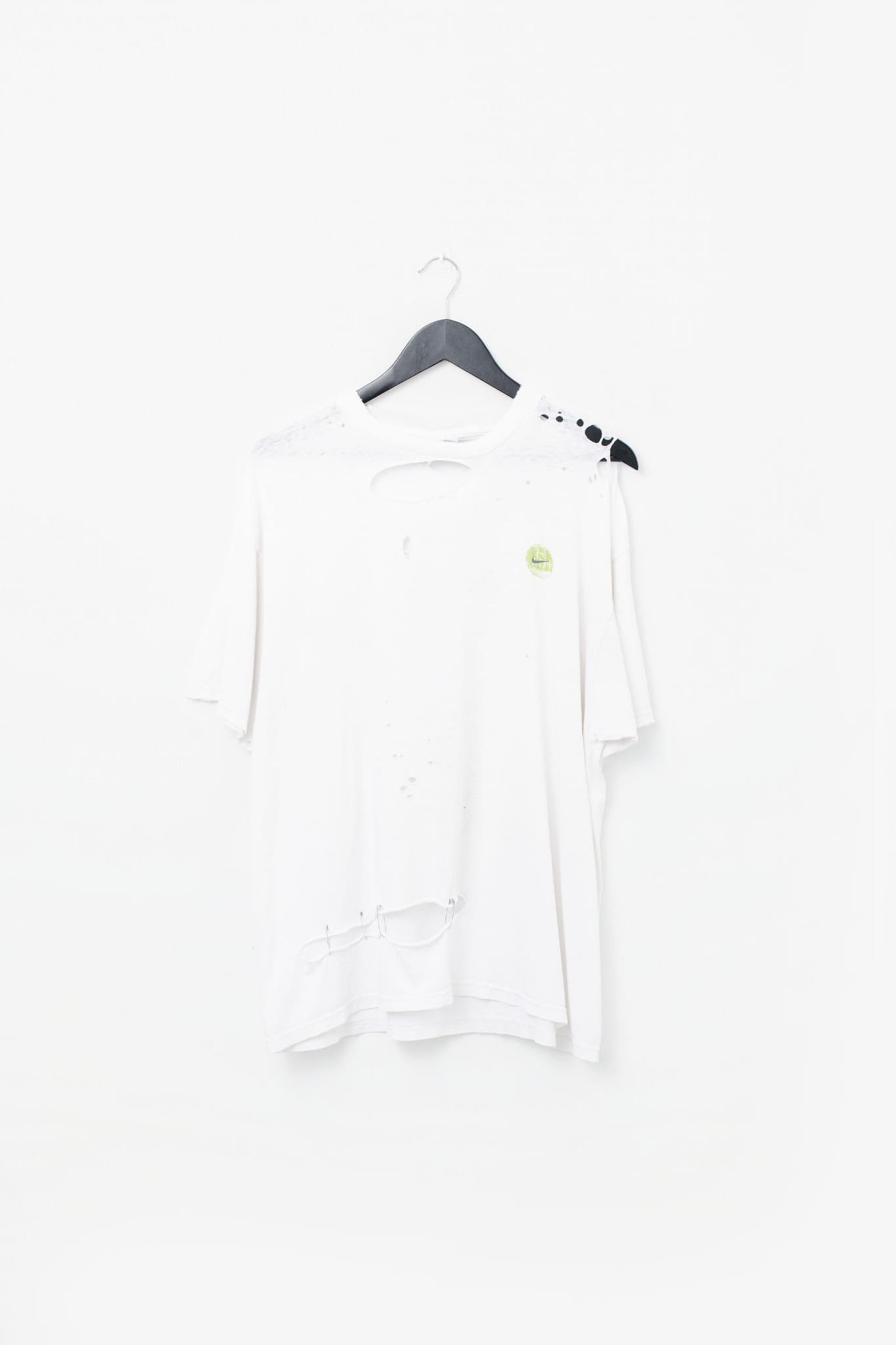 Vintage Thrashed & Threadbare Nike T-Shirt — photo 1 of 3