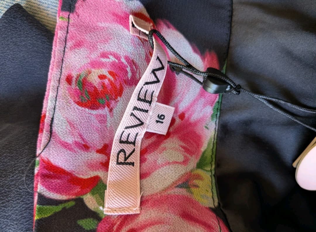 Review Floral Ruffled Mini Skirt Size 16 Black Polyester — photo 8 of 9