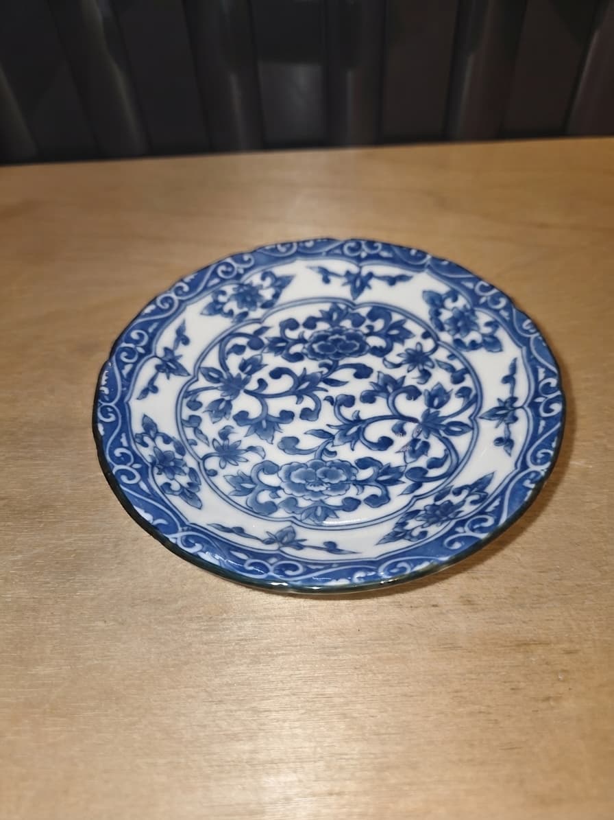 Vintage Blue and White Floral Porcelain Saucer — photo 1 of 2
