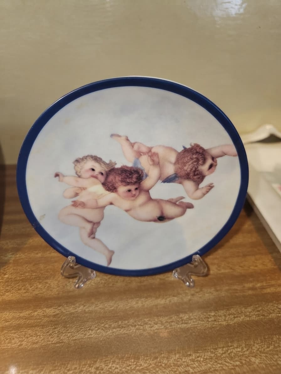 Vintage Decorative Porcelain Plate with Cherub Motif