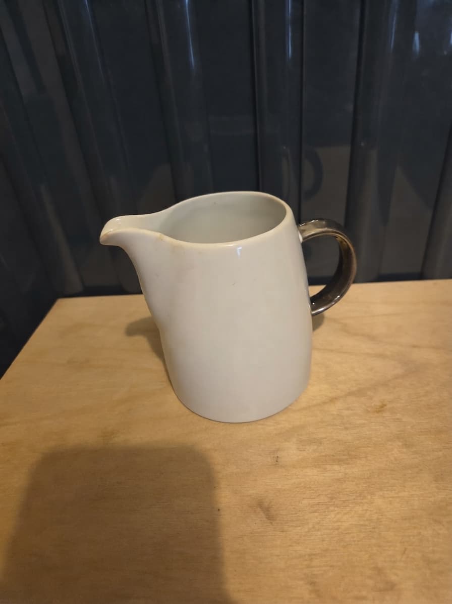 White Ceramic Creamer Pitcher with Metallic Handle — photo 1 of 2