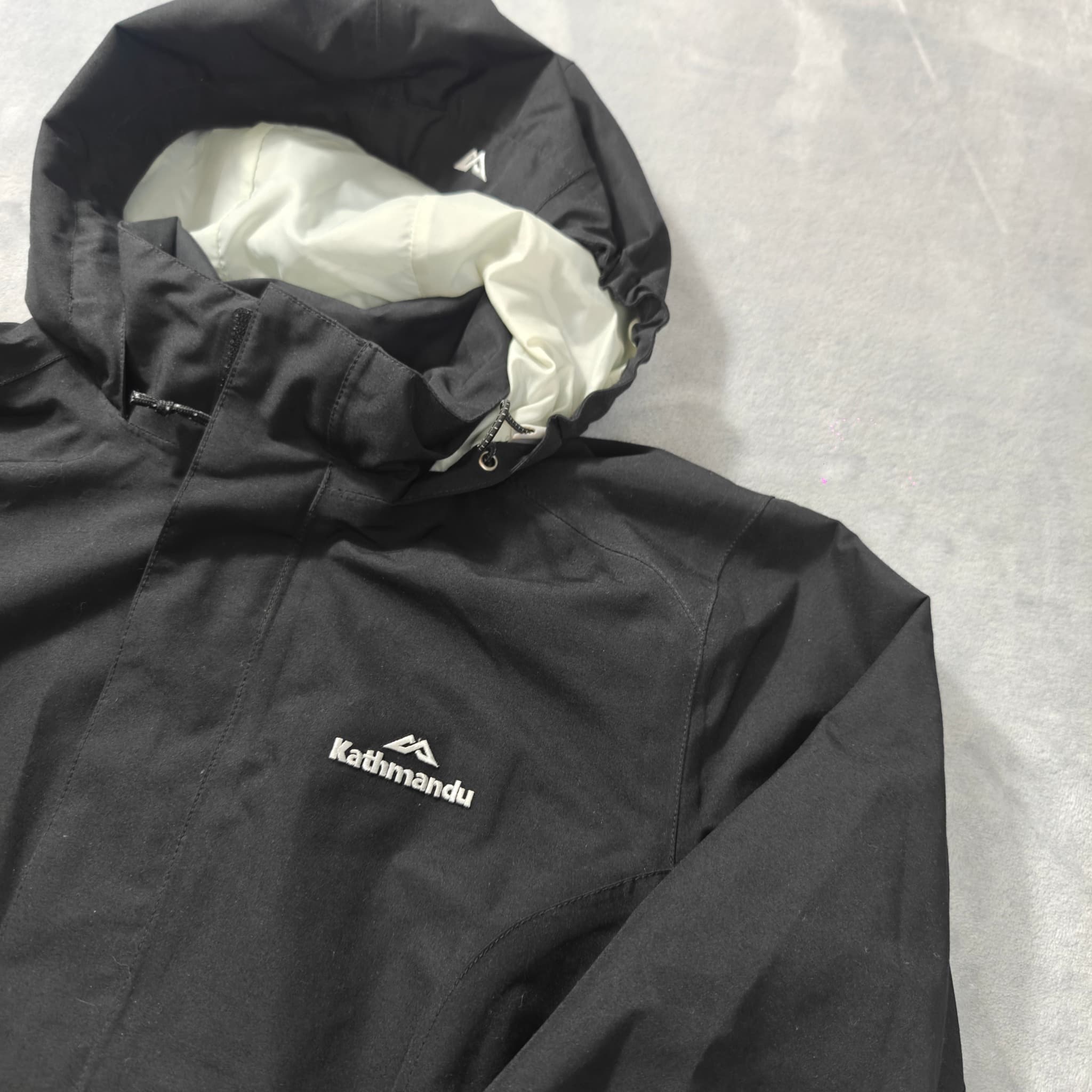 Kathmandu ngx2 Waterproof Rain Jacket Women's Size 14 Black Hooded — photo 2 of 7