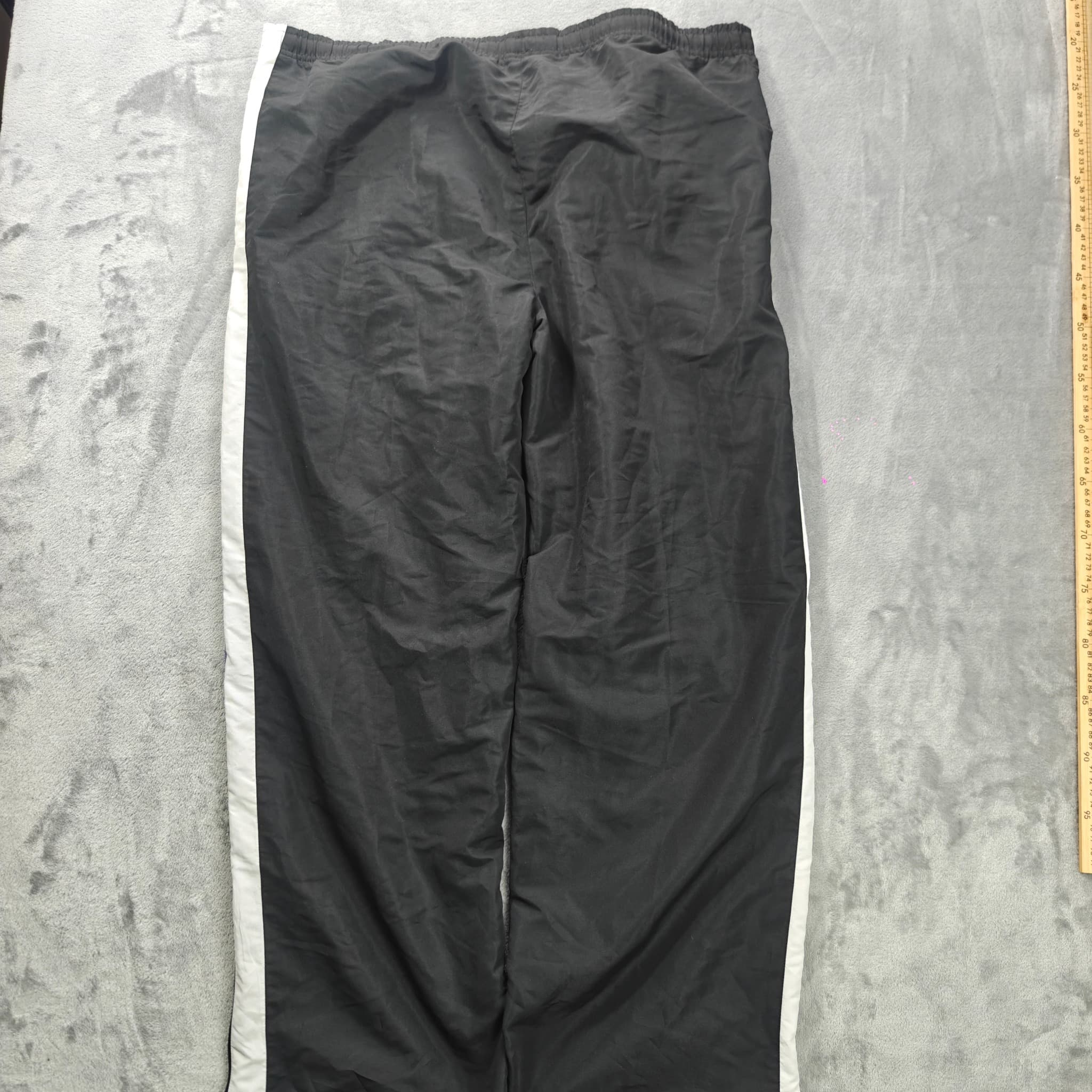 Vintage New Balance Women's Black Nylon Track Pants Size XL White Blue Stripe Athletic — photo 7 of 7