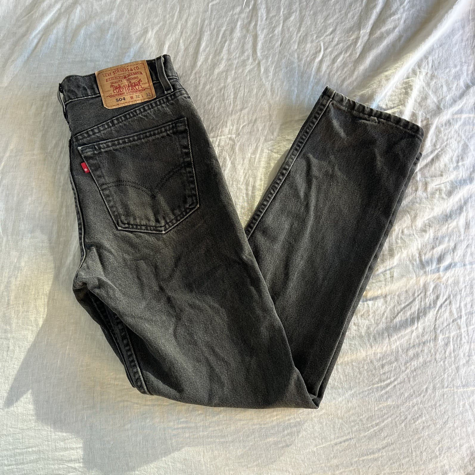 Vintage Levi’s 504 Faded Black Straight Leg Jeans Made in Australia Size 30 — photo 1 of 10