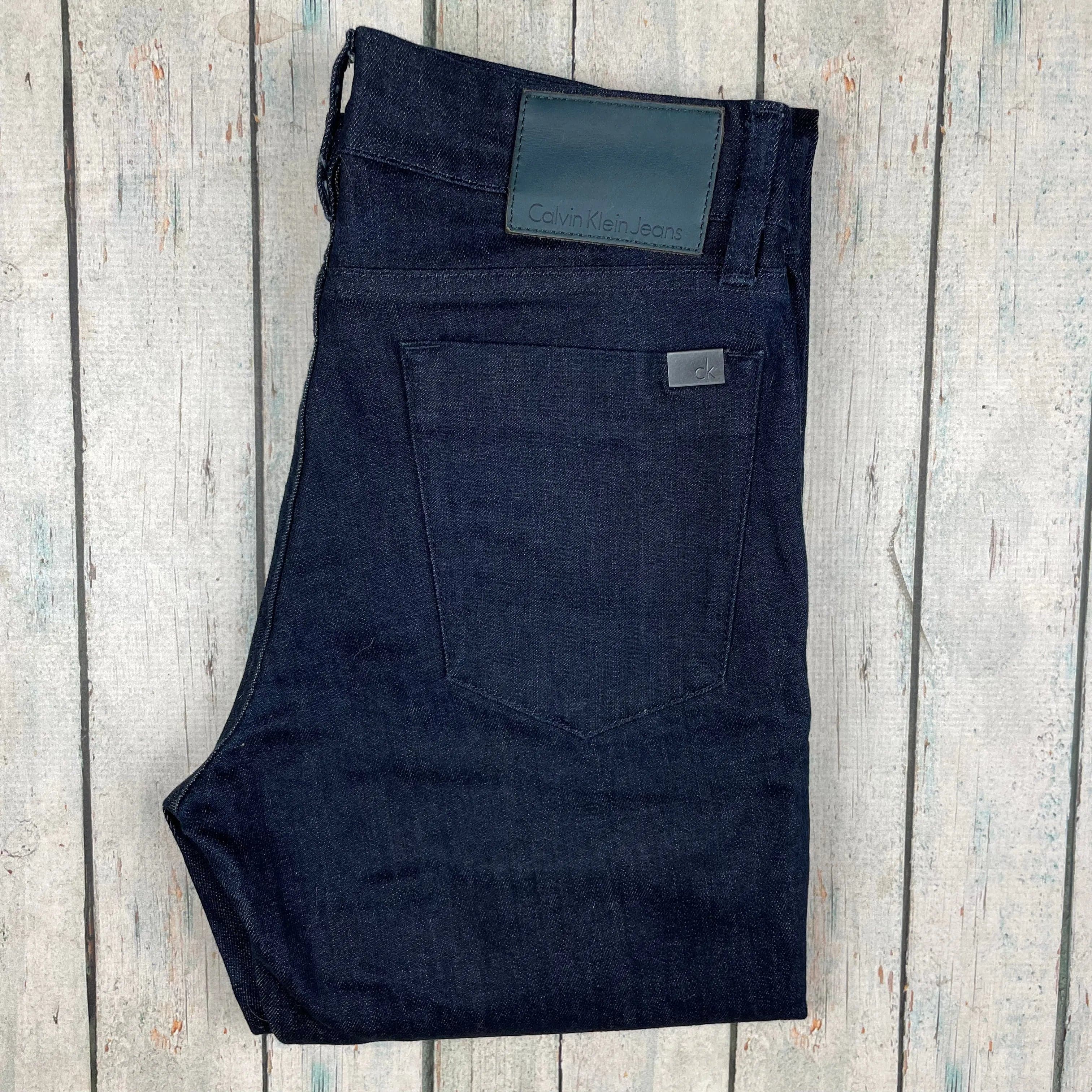 Calvin Klein Slim Straight Dark Wash Jeans - Size 28/34 — photo 5 of 7