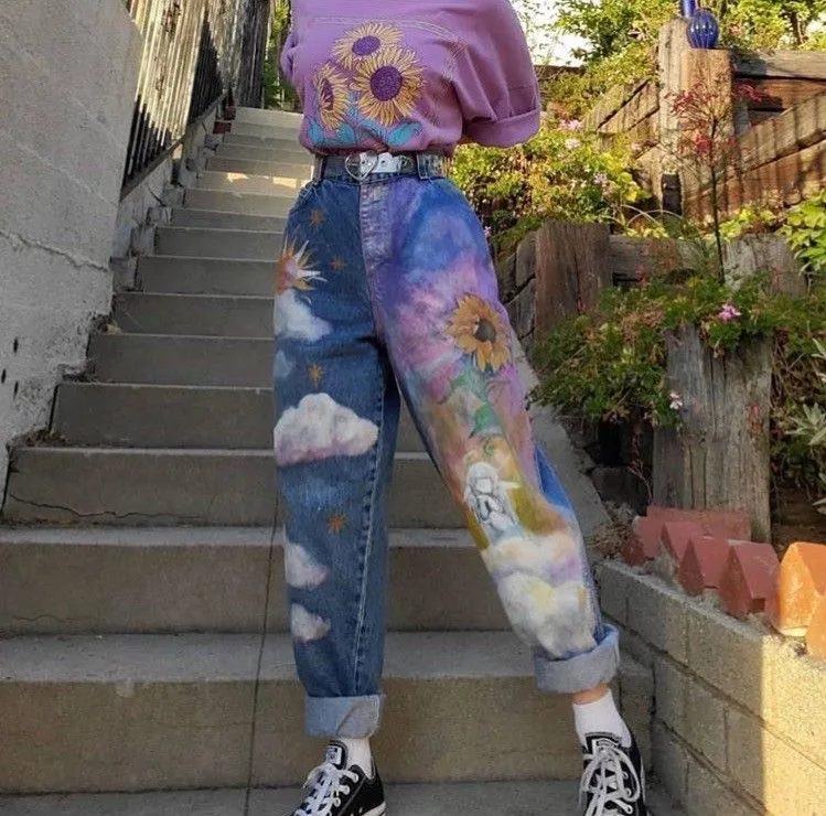 Art Hoe aesthetic — The digitally collaged jeans featuring sunflowers and classical painting elements, combined with the overall styling, are a direct and strong representation of the Art Hoe aesthetic's visual signature.