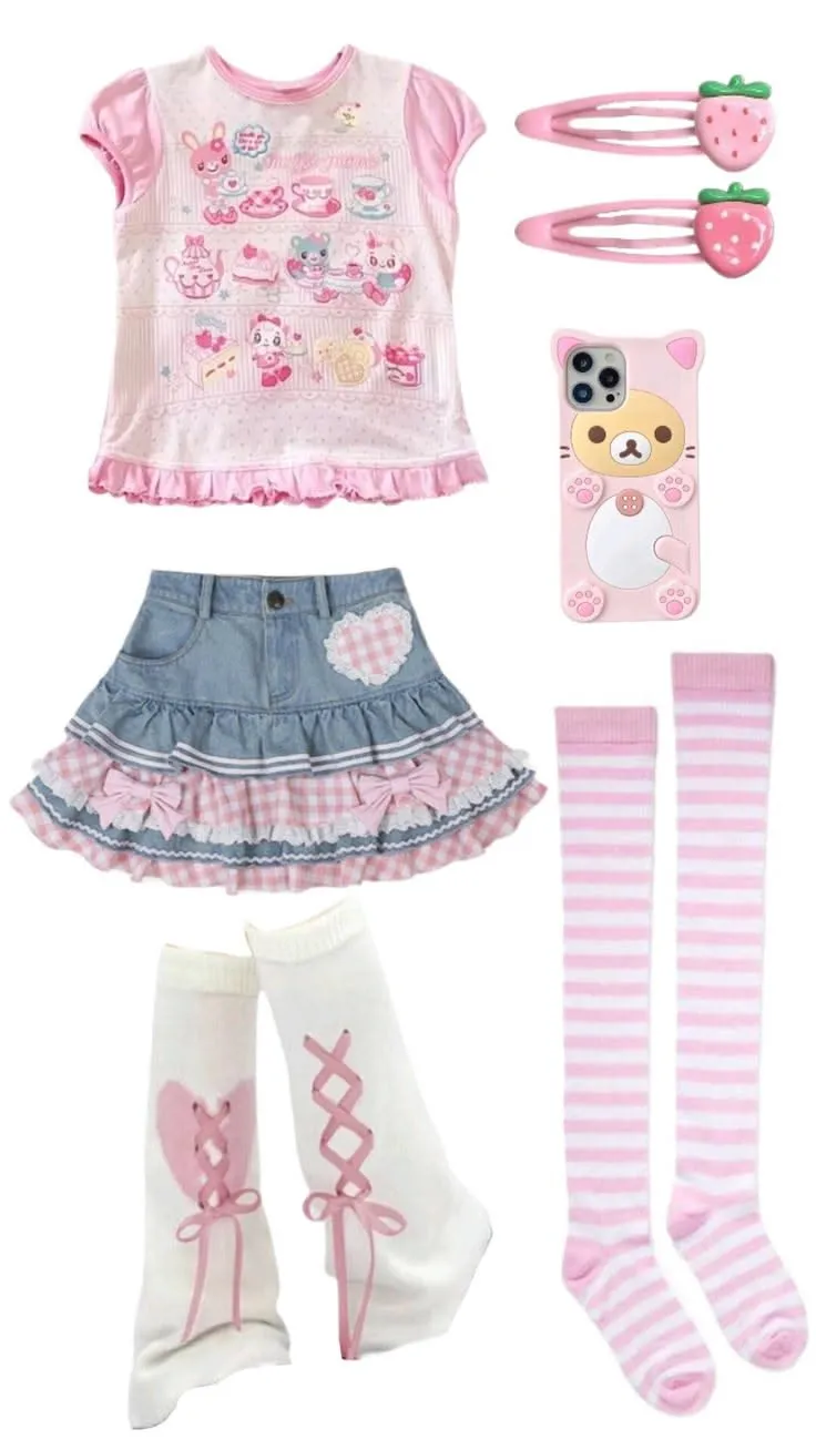 Cutecore aesthetic — The image features a hyper-saturated kawaii aesthetic with pink ribbons, character graphics on the shirt, and pastel colors. The skirt has bows and ruffles, and the accessories like the strawberry hair clips and bear phone case align with the description. The striped socks and lace-up leg warmers also fit the "bubblegum-punk layering" aspect.