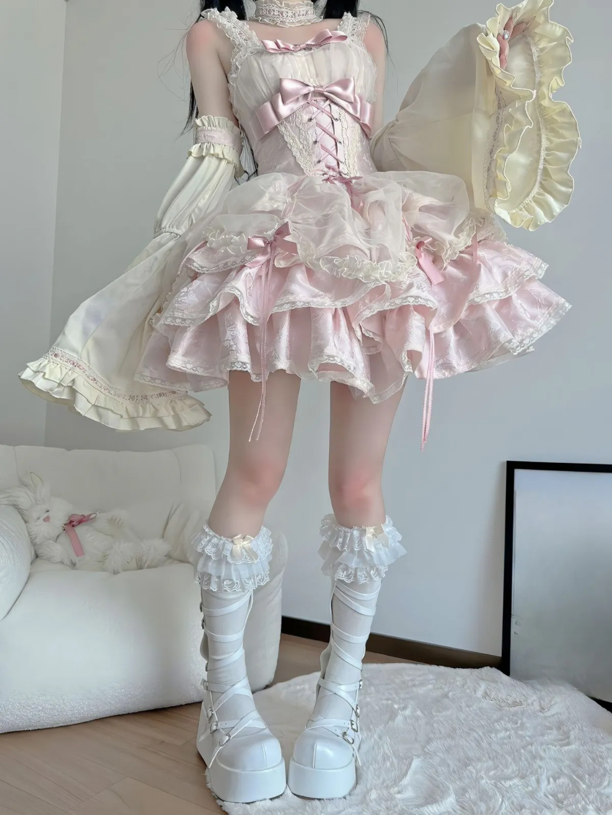 Dollette aesthetic — This image perfectly embodies Dollette with its hyperfeminine, layered pink and white ruffles, lace, bows, and doll-like accessories, directly referencing the 'living doll' aspect.