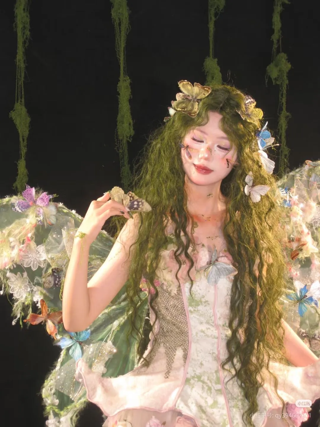 Fairycore aesthetic — The image perfectly embodies the Fairycore aesthetic with its ethereal nature-spirit theme, featuring butterfly motifs, delicate floral elements, sheer fabrics, and a pastel color palette, all contributing to a whimsical, enchanted forest fantasy.