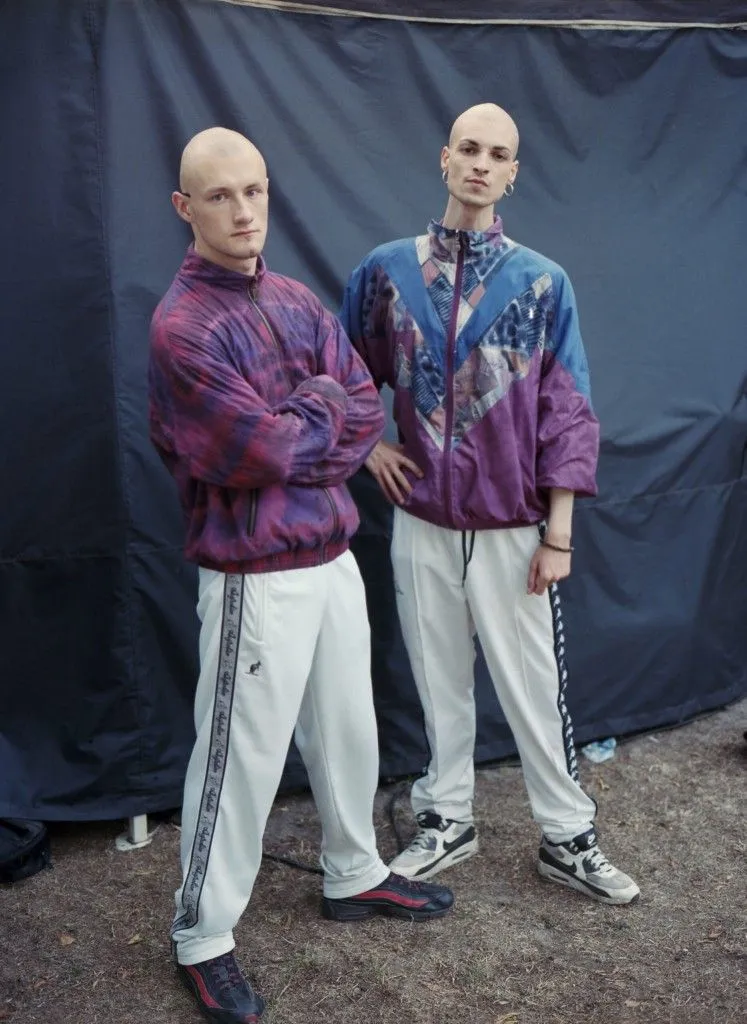 Gabber aesthetic — Bald heads, matching tracksuits (Australian L'Alpina style), and Nike Air Max Classic BW are all key visual signifiers of the Gabber aesthetic.