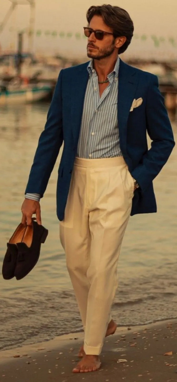 Italian Sprezzatura aesthetic — The deconstructed blazer, soft-shouldered silhouette, open-collar shirt, and tailored trousers are a perfect visual representation of sprezzatura.