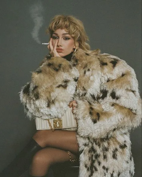 Mafia Aesthetic aesthetic — The leopard print fur coat, gold chain, and red lips are direct visual cues from the 'mob wife' aspect of the Mafia Aesthetic.
