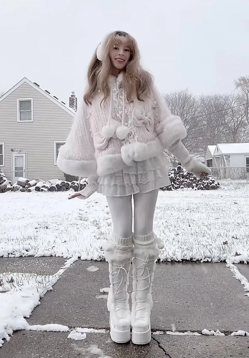 Marshmallow Girl aesthetic — The outfit features a loose and fluffy silhouette with soft pastel colors (primarily pink and white), plush textures, and rounded, cozy clothing shapes, aligning perfectly with the yurufuwa aesthetic. The inclusion of kawaii accessories like fluffy leg warmers and the overall gentle, airy impression strongly match the Marshmallow Girl description. The only minor deviation is the lack of explicit emphasis on body positivity, which is a core tenet of the aesthetic but not visually represented in a single outfit.