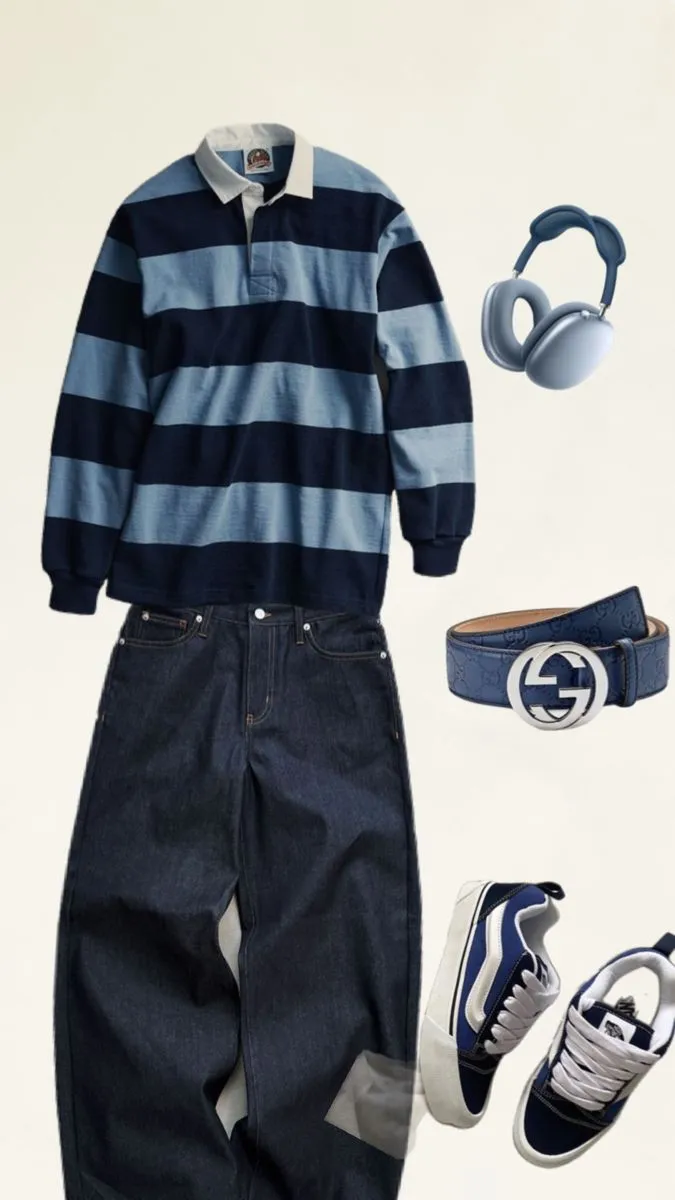 Older Brother Core aesthetic — The combination of very baggy dark wash jeans, Vans skate sneakers, and a striped rugby shirt (a common layering piece in the era) perfectly captures the described visual signature and era.