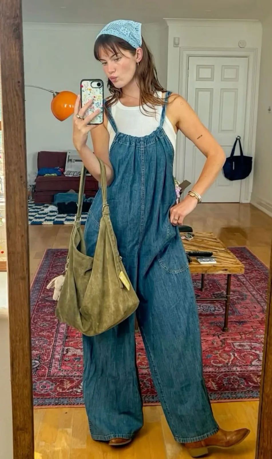 Plant Mom aesthetic — Denim overalls, oversized tote bag, and a relaxed, comfortable vibe strongly align with the Plant Mom aesthetic.